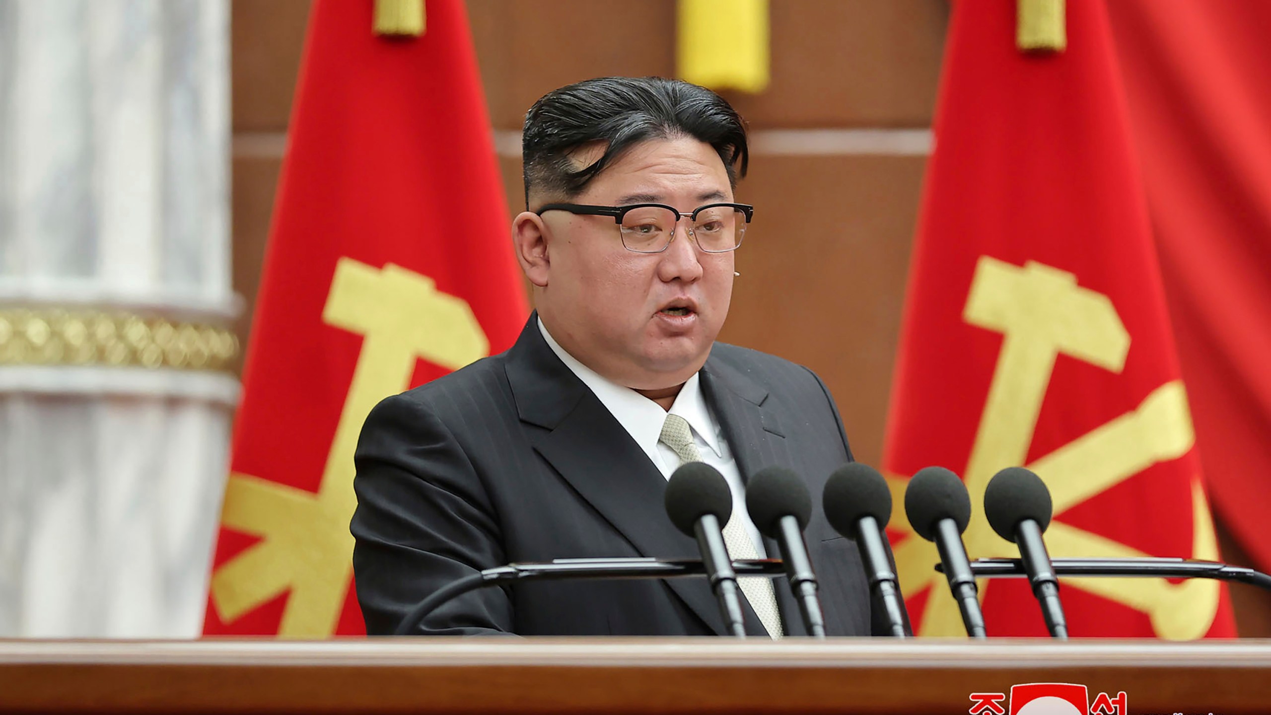 In this photo provided by the North Korean government, North Korean leader Kim Jong Un delivers a speech during a year-end plenary meeting of the ruling Workers’ Party, which was held between Dec. 26, and Dec. 30, 2023, in Pyongyang, North Korea. Independent journalists were not given access to cover the event depicted in this image distributed by the North Korean government. The content of this image is as provided and cannot be independently verified. Korean language watermark on image as provided by source reads: "KCNA" which is the abbreviation for Korean Central News Agency. (Korean Central News Agency/Korea News Service via AP)