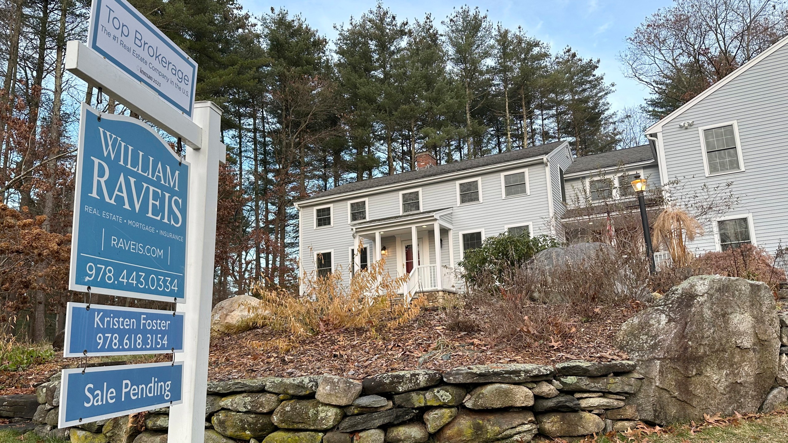 A sale pending sign is displayed in front of a home in Sudbury, Mass., on Saturday, Dec. 2, 2023. On Thursday, Freddie Mac reports on this week's average U.S. mortgage rates. (AP Photo/Peter Morgan)