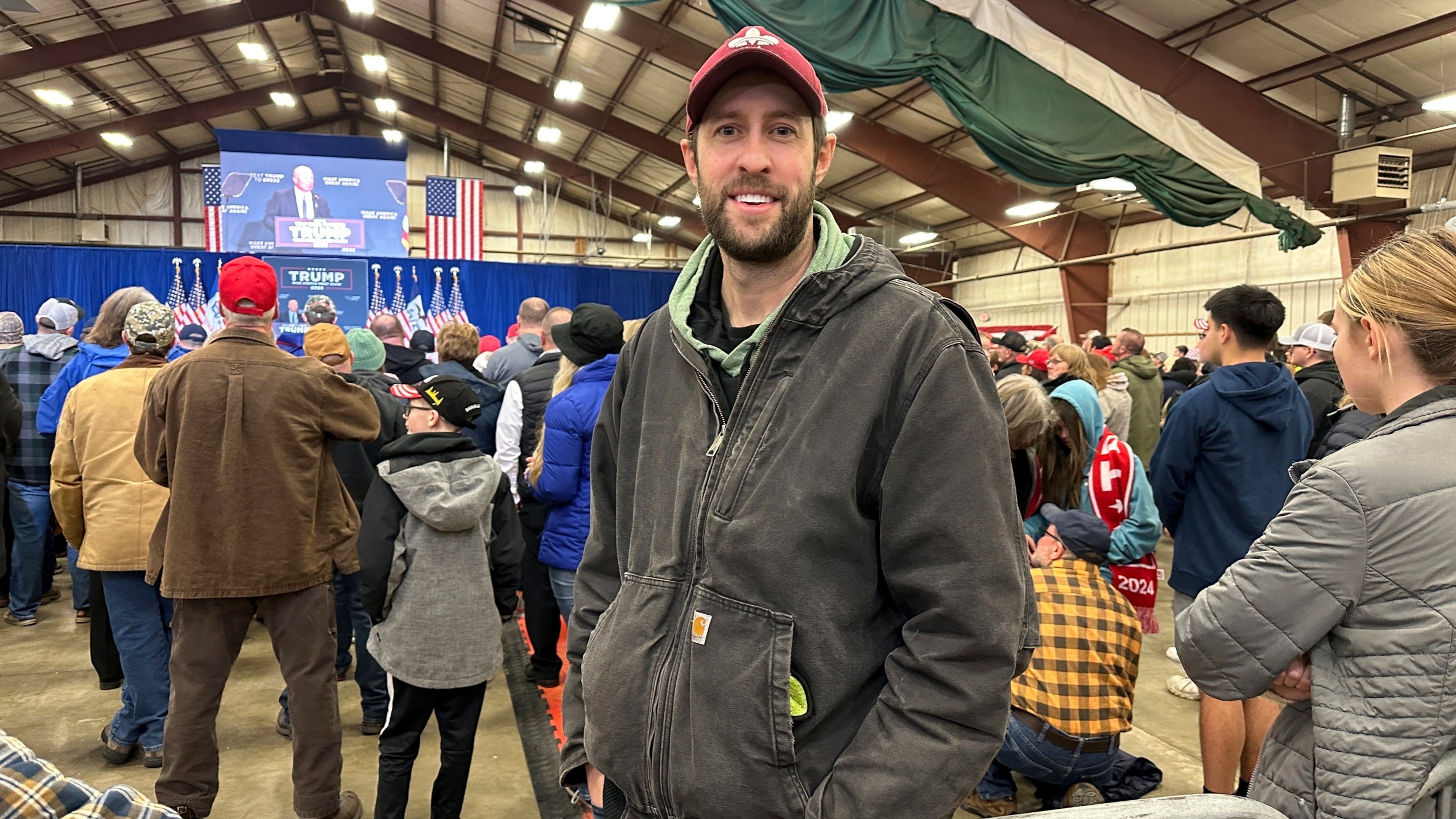 William Caspers, a 37-year-old farmer from Rockwell, Iowa, attends a rally for Donald Trump in Mason City, Iowa, on Friday, Jan. 5, 2024. Caspers says he's supporting Trump "100%" in 2024 but wasn't sure where or when to caucus for him. Though Trump is the favorite to win the Iowa Republican caucuses, some of his supporters aren't well-versed on the complexities of the process and his campaign has scaled back its door-knocking, get-out-the-vote operation in favor of other techniques to motivate supporters. (AP Photo/Steve Peoples)