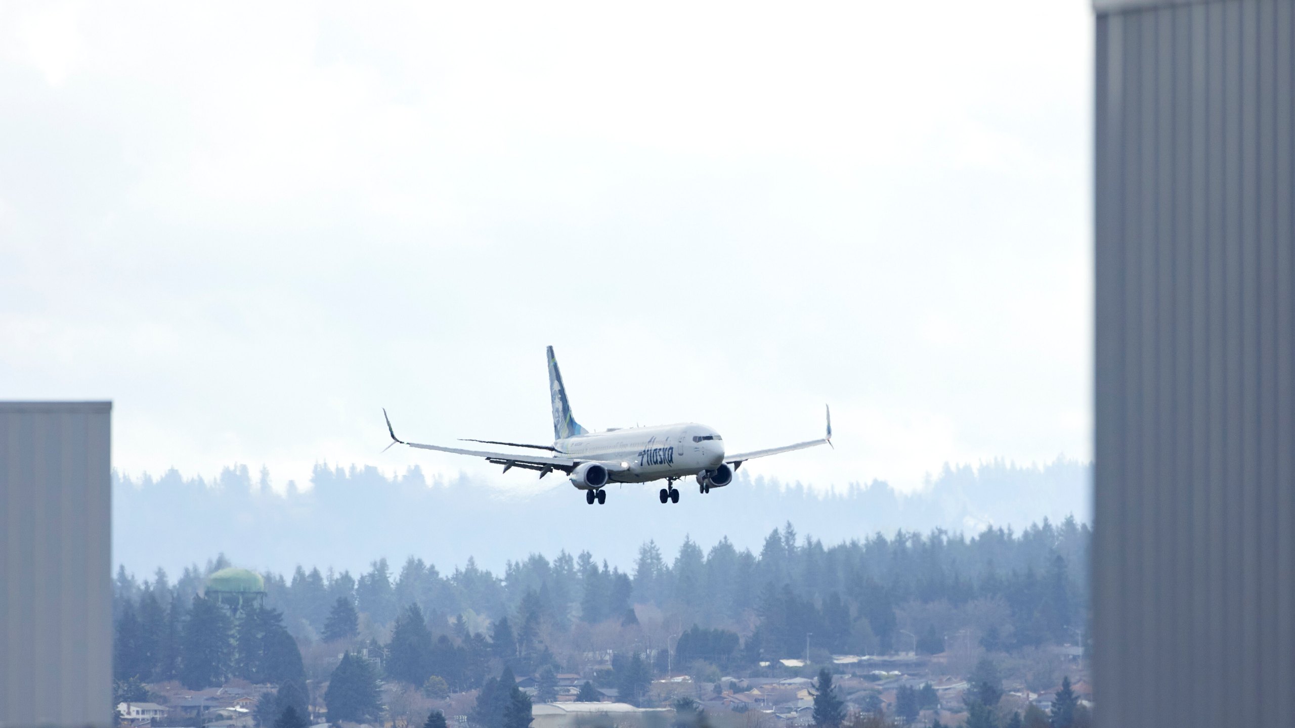 An Alaska Airlines Boeing 737-990ER flight 337 from Fort Lauderdale, Fla., lands at Portland International Airport in Portland, Ore., Saturday, Jan. 6, 2024. The FAA has ordered the temporary grounding of Boeing 737 MAX 9 aircraft after part of the fuselage blew out during a flight. (AP Photo/Craig Mitchelldyer)