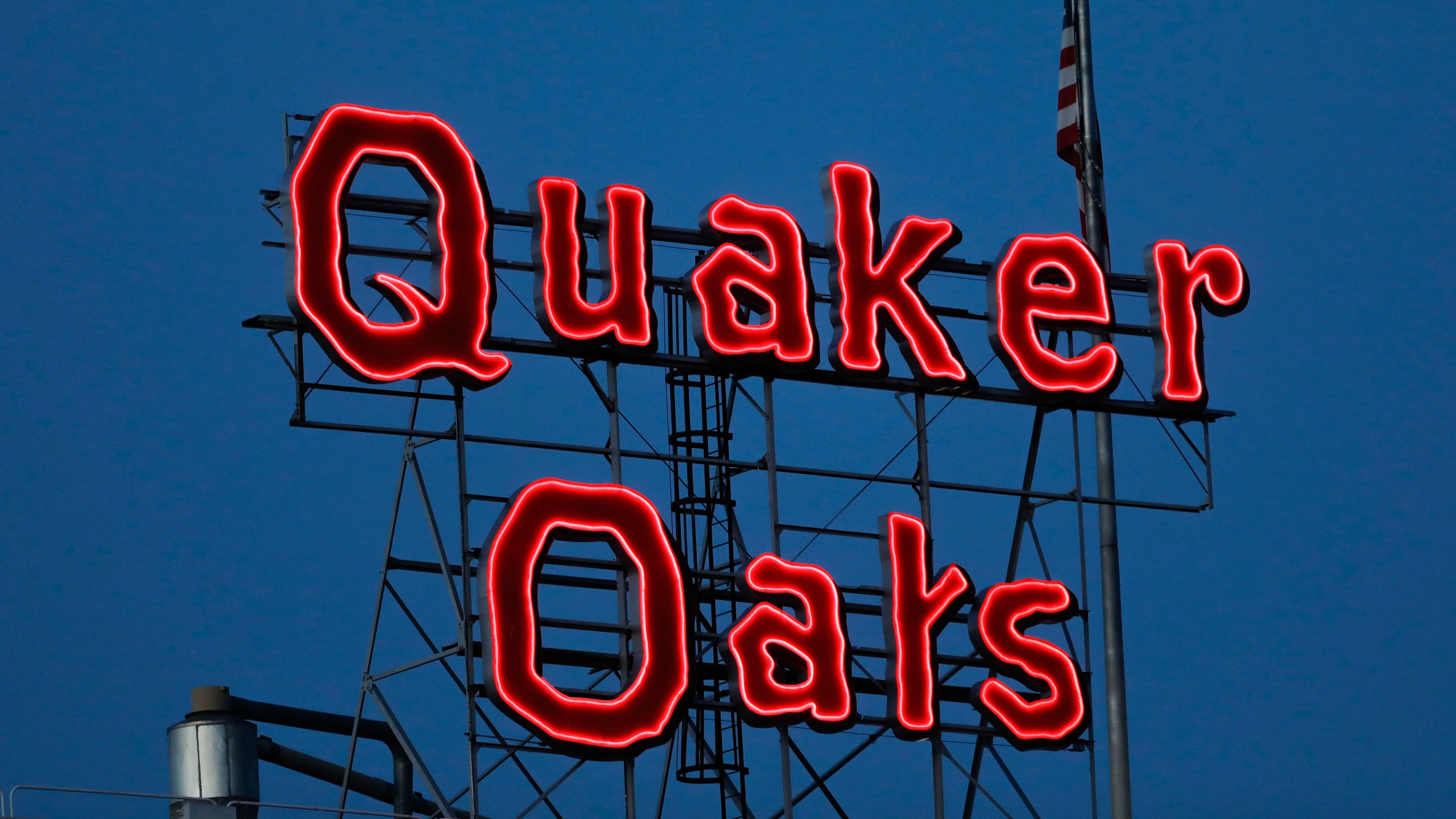 FILE - The Quaker Oats sign is seen in Cedar Rapids, Iowa on Tuesday, June 8, 2021. The Quaker Oats Company has expanded a December recall of more than 40 products that may be contaminated with salmonella to include two dozen additional types of granola bars, cereals and snack foods, Friday, Jan. 12, 2023. (Rebecca F. Miller/The Gazette via AP, File)