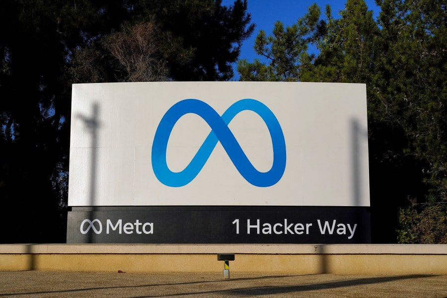 FILE - Meta's logo is seen on a sign at the company's headquarters, Nov. 9, 2022, in Menlo Park, Calif. Newly unredacted documents from New Mexico’s lawsuit against Meta released Wednesday, Jan. 17, 2024, underscore the Facebook and Instagram parent’s “historical reluctance” to keep children safe on its platforms, according to the complaint. (AP Photo/Godofredo A. Vásquez, File)