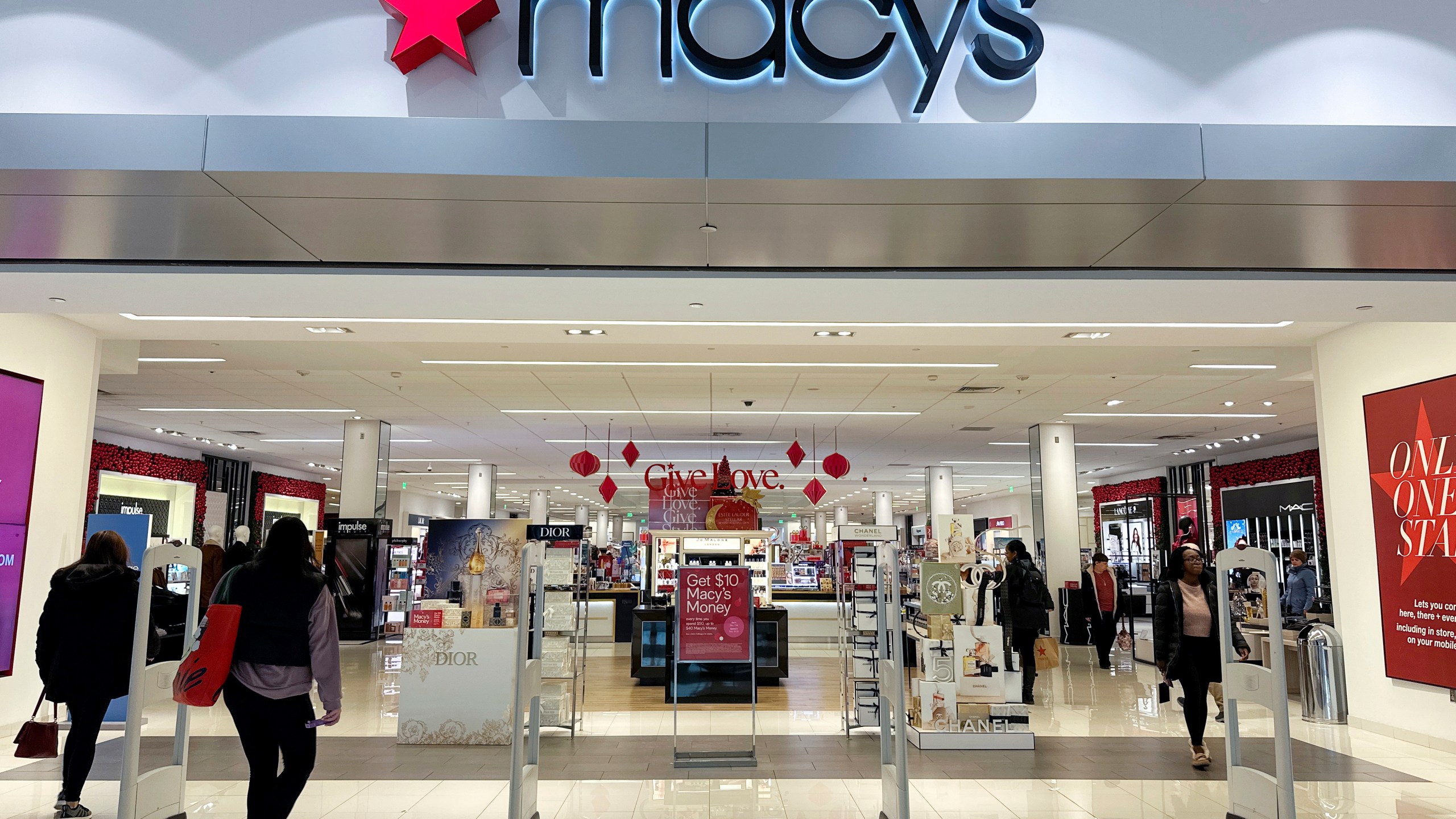 FILE - A Macy's department store is in Bay Shore, Long Island, New York, on Tuesday, December 12, 2023. Layoffs are hitting the world of retail especially hard this week, Friday, Jan. 19, 2024, as Macy’s is laying off roughly 2,350 employees, or about 3.5% of its total headcount. The Wall Street Journal and others also reported that the iconic department giant plans to close five stores(AP Photo/Ted Shaffrey, File)