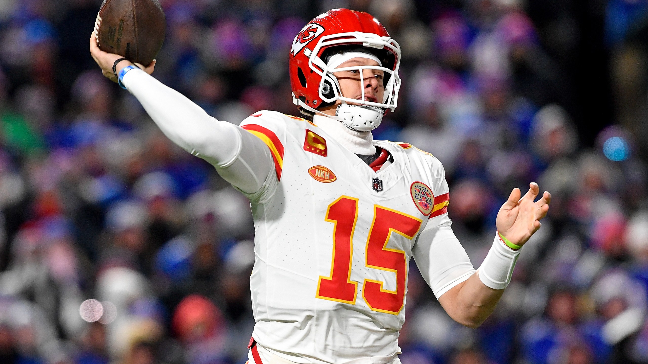 Kansas City Chiefs quarterback Patrick Mahomes (15) passes against the Buffalo Bills during the first quarter of an NFL AFC division playoff football game, Sunday, Jan. 21, 2024, in Orchard Park, N.Y. (AP Photo/Adrian Kraus)