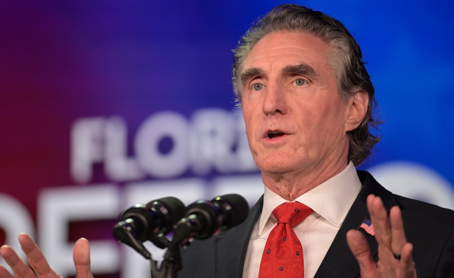 FILE - North Dakota Gov. Doug Burgum speaks to attendees at the Republican Party of Florida Freedom Summit, Nov. 4, 2023, in Kissimmee, Fla. Gov. Burgum announced Monday, Jan. 22, 2024 that he will not seek a third term as governor, more than a month after he ended his bid for the GOP presidential nomination. (AP Photo/Phelan M. Ebenhack, file)