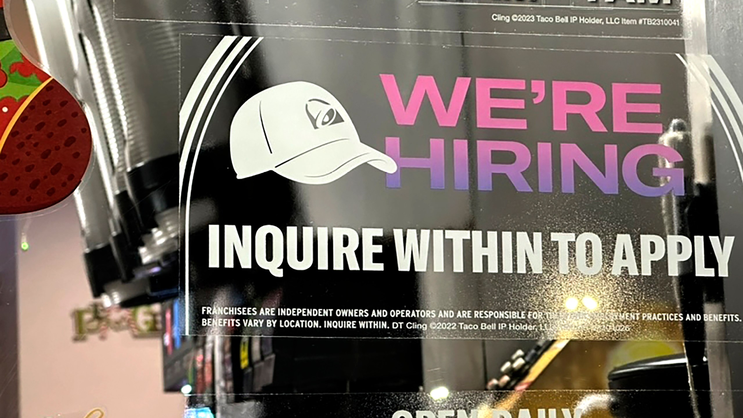 A hiring sign is displayed at a restaurant in Glenview, Ill., Tuesday, Dec.12, 2023. On Thursday, the Labor Department reports on the number of people who applied for unemployment benefits last week. (AP Photo/Nam Y. Huh)