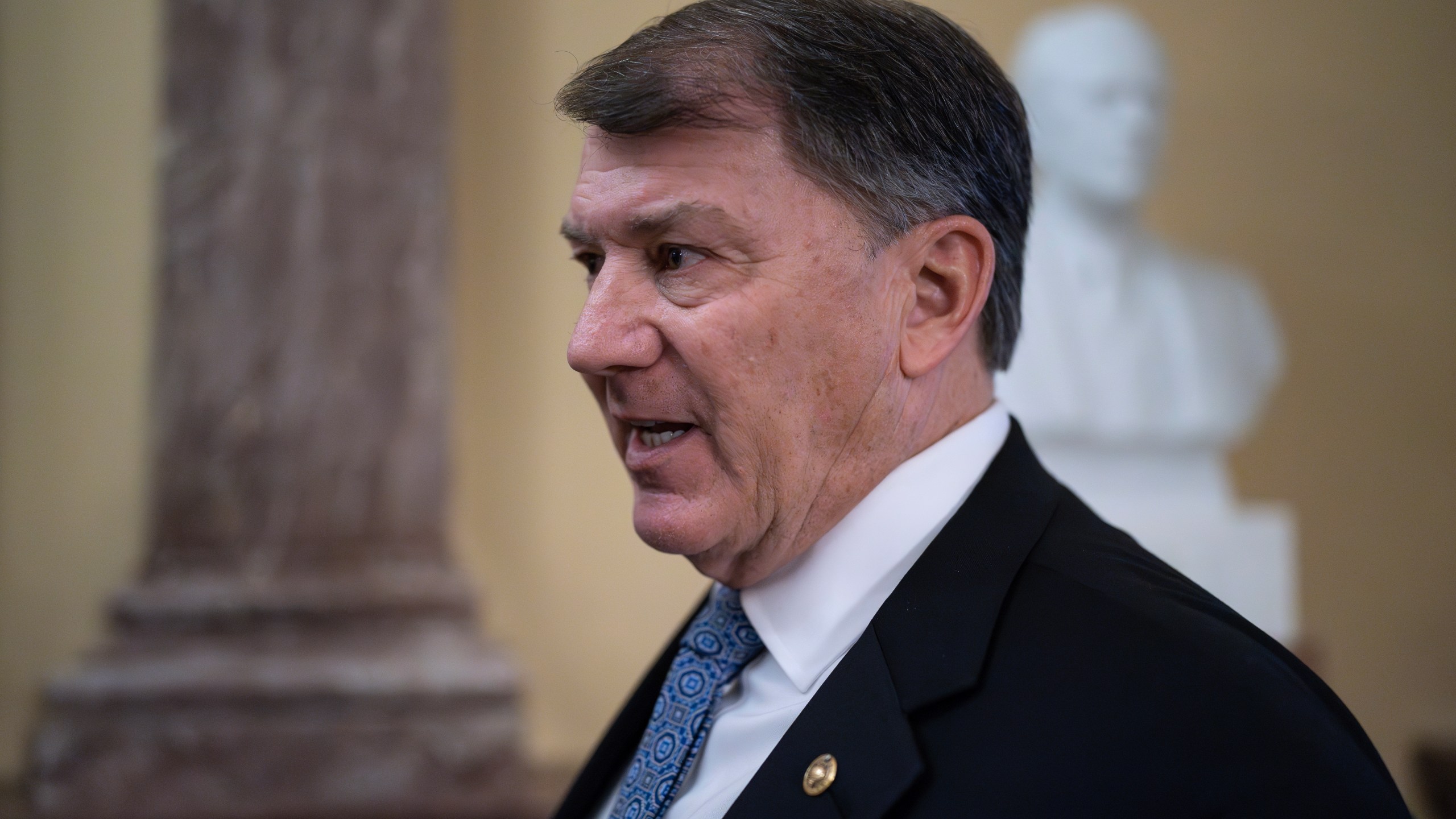 Sen. Mike Rounds, R-S.D., speaks with reporters about the border security talks, outside the chamber at the Capitol in Washington, Thursday, Jan. 25, 2024. Any bipartisan border deal could be doomed because of resistance from former President Donald Trump. (AP Photo/J. Scott Applewhite)