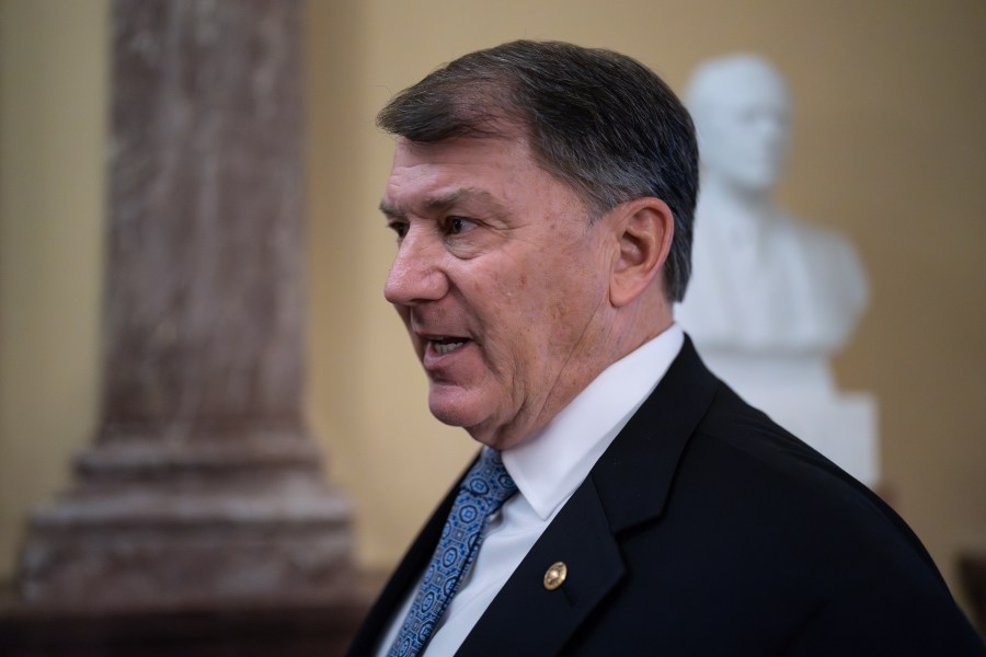 Sen. Mike Rounds, R-S.D., speaks with reporters about the border security talks, outside the chamber at the Capitol in Washington, Thursday, Jan. 25, 2024. Any bipartisan border deal could be doomed because of resistance from former President Donald Trump. (AP Photo/J. Scott Applewhite)