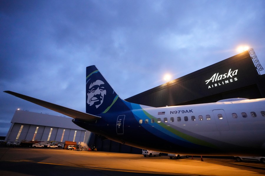 File - An Alaska Airlines Boeing 737 Max 9 awaits inspection at the airline's hangar at Seattle-Tacoma International Airport onJan. 10, 2024, in SeaTac, Wash. Boeing 737 Max 9 jetliners will carry passengers in the United States again, starting this weekend, for the first time since they were grounded after a panel blew out of the side of one of the planes. (AP Photo/Lindsey Wasson, File)