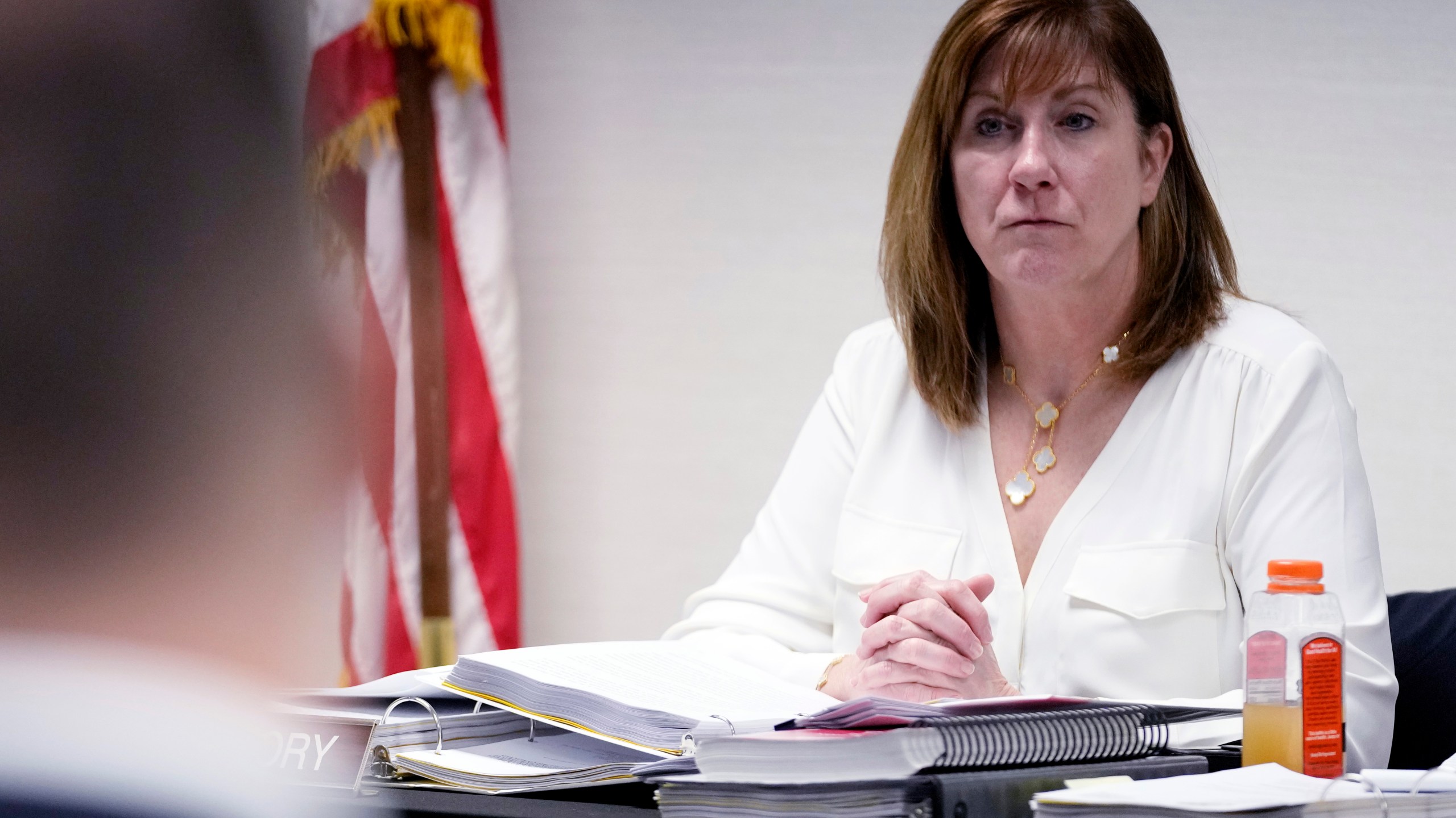 Board member Catherine S. McCrory listens during the Illinois State Board of Elections meeting in Chicago, Tuesday, Jan. 30, 2024. Illinois’ election board kept former President Donald Trump on the state’s primary ballot, a week before the U.S. Supreme Court hears arguments on whether the Republican’s role in the Jan. 6, 2021, attack on the U.S. Capitol disqualifies him from the presidency. (AP Photo/Nam Y. Huh)