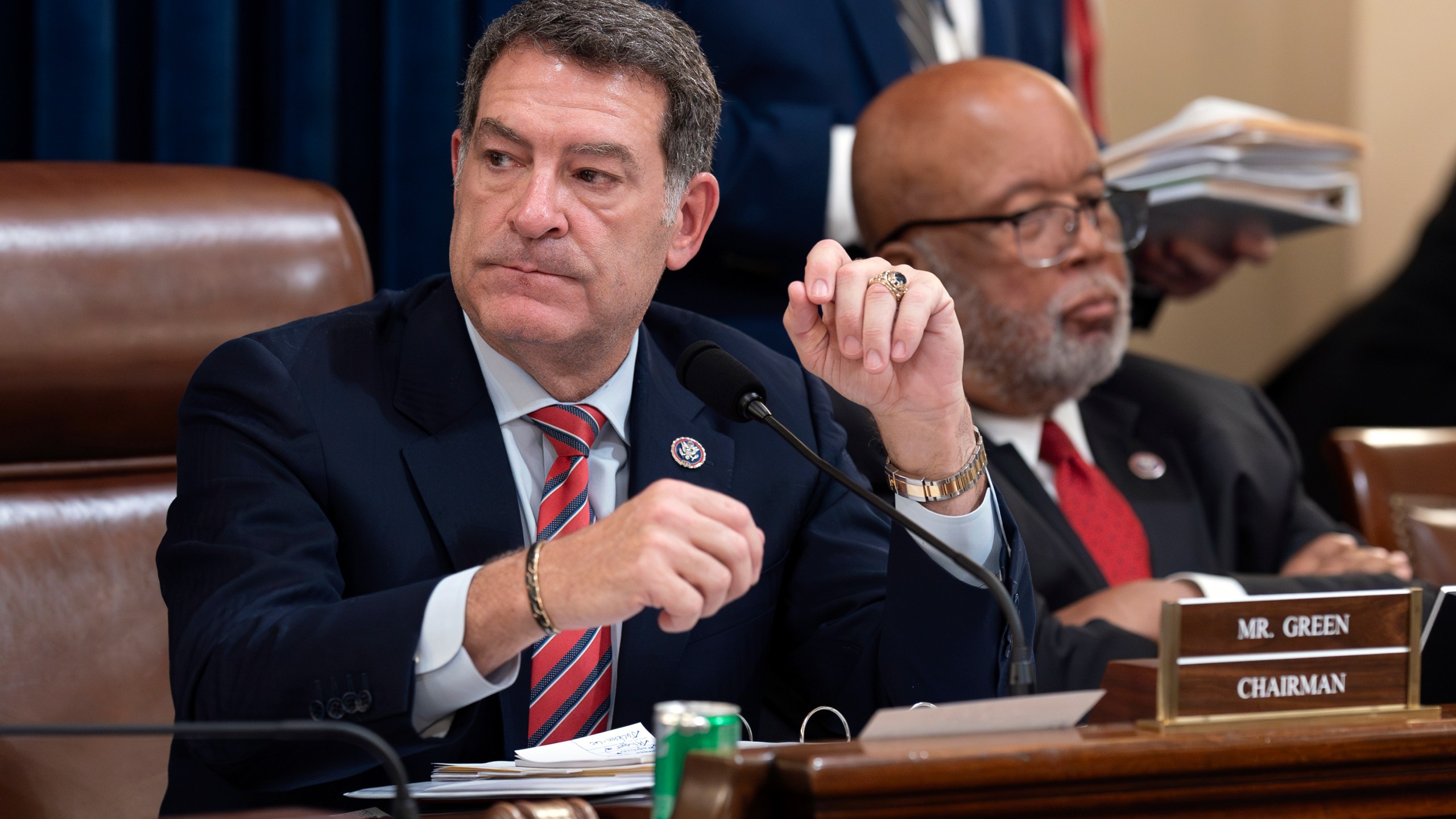 Chairman Mark Green, R-Tenn., center, joined by Rep. Bennie Thompson, D-Miss., the ranking member, leads the House Homeland Security Committee move to impeach Secretary of Homeland Security Alejandro Mayorkas over the crisis at the U.S.-Mexico border, at the Capitol in Washington, Tuesday, Jan. 30, 2024. (AP Photo/J. Scott Applewhite)