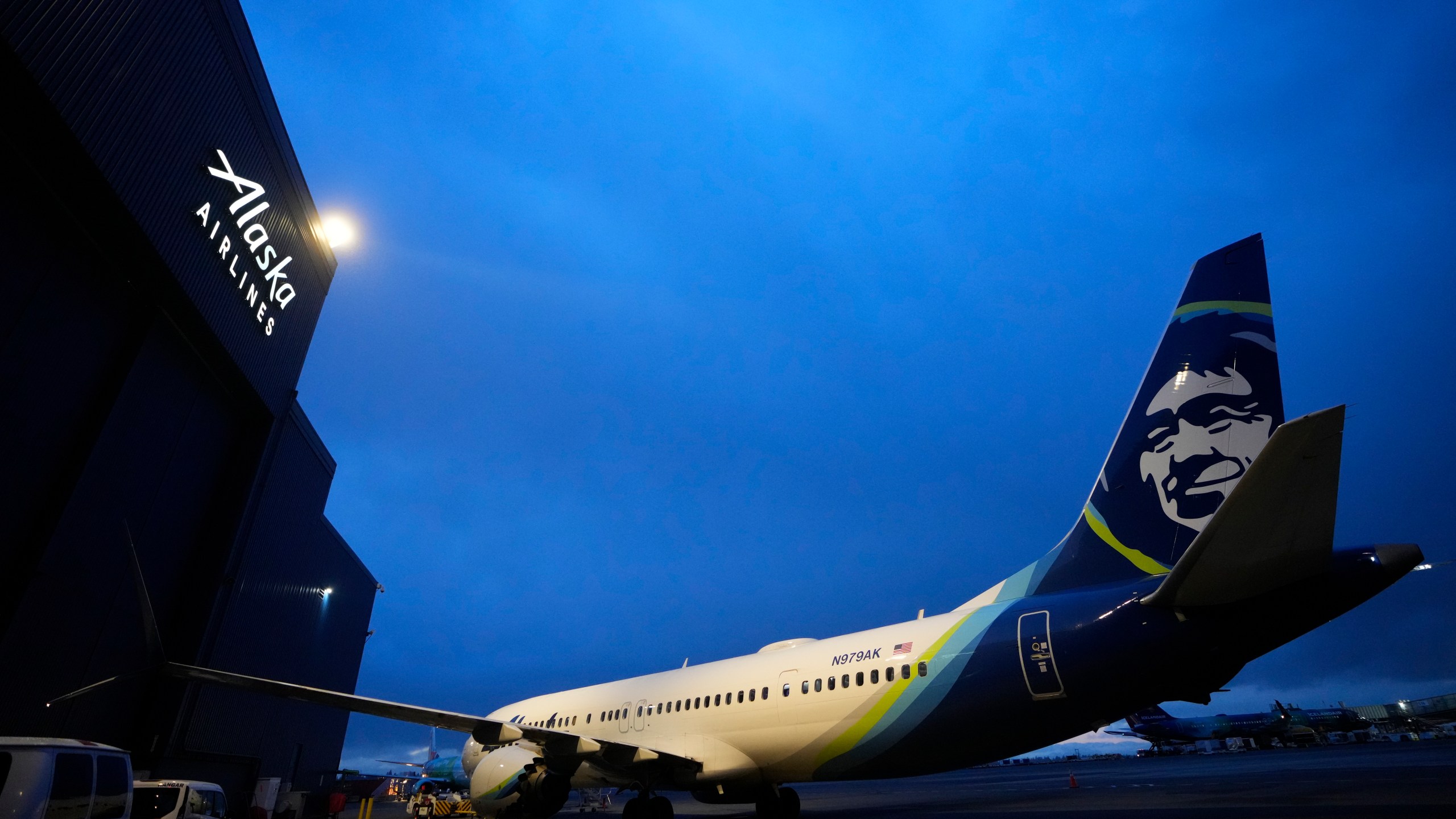 File - An Alaska Airlines Boeing 737 Max 9 aircraft awaits inspection outside the airline's hangar at Seattle-Tacoma International Airport Jan. 10, 2024, in SeaTac, Wash. Boeing declined to offer its own forecast of 2024 results — an indication of the uncertainty swirling around the company since a 737 Max 9 operated by Alaska Airlines suffered a midflight blowout of a panel called a door plug on Jan. 5. (AP Photo/Lindsey Wasson, File)