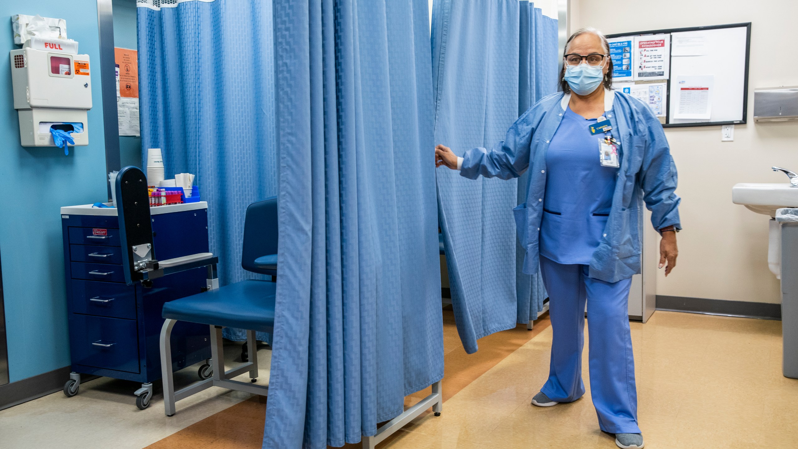 File - A nurse works in the laboratory room in El Nuevo San Juan Health Center at the Bronx borough in New York, Jan. 11, 2024. Health care providers — hospitals, doctors' offices, and dentists — added a whopping 300,000 positions in recent months. (AP Photo/Eduardo Munoz Alvarez, File)