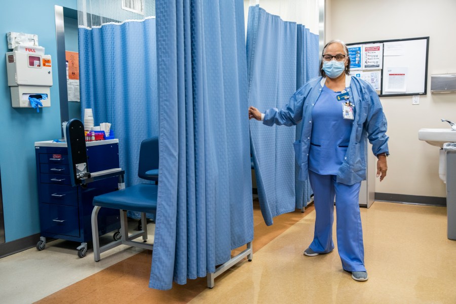 File - A nurse works in the laboratory room in El Nuevo San Juan Health Center at the Bronx borough in New York, Jan. 11, 2024. Health care providers — hospitals, doctors' offices, and dentists — added a whopping 300,000 positions in recent months. (AP Photo/Eduardo Munoz Alvarez, File)