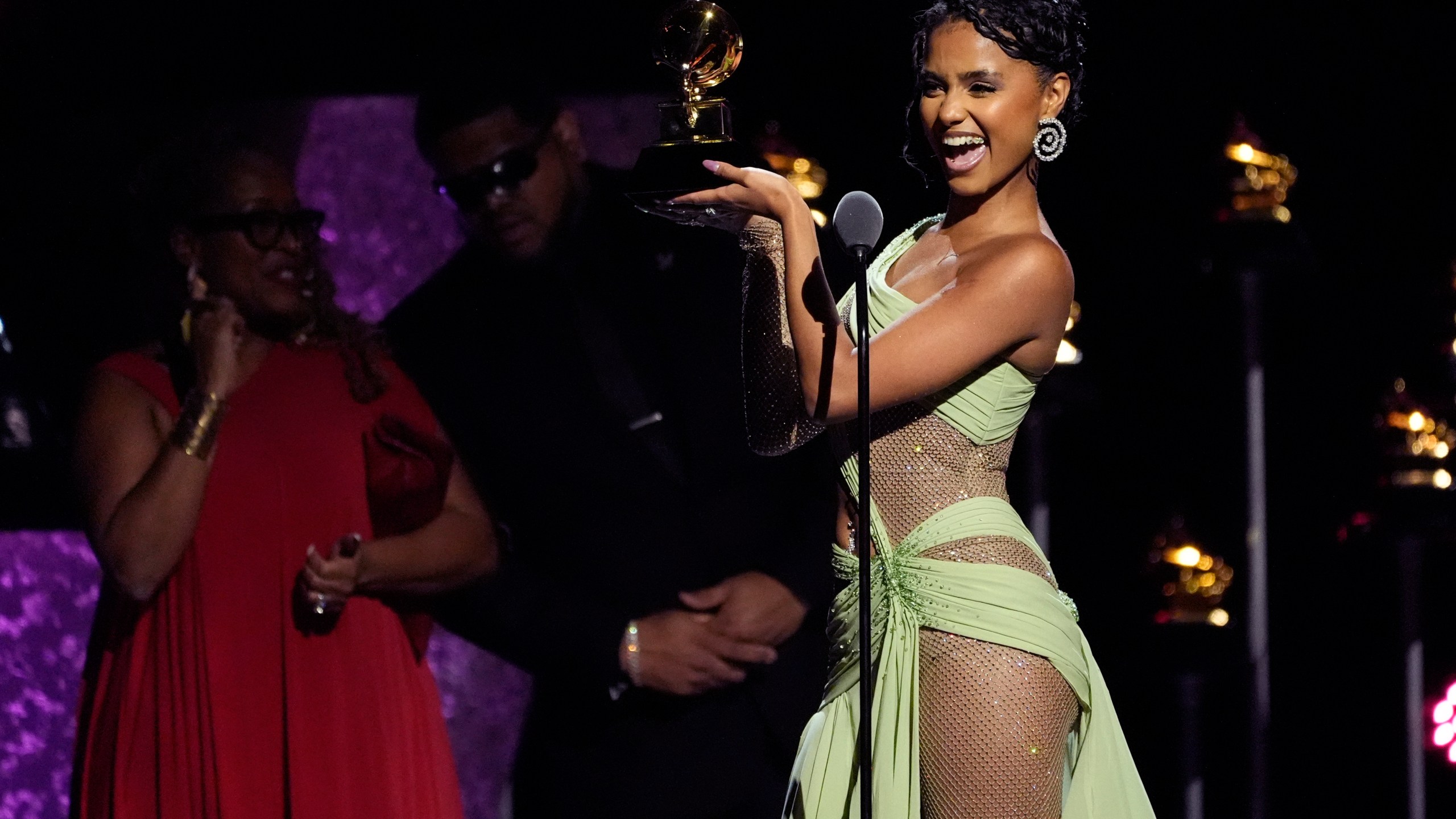 Tyla accepts the award for best african music performance for "Make Me Water" during the 66th annual Grammy Awards on Sunday, Feb. 4, 2024, in Los Angeles. (AP Photo/Chris Pizzello)