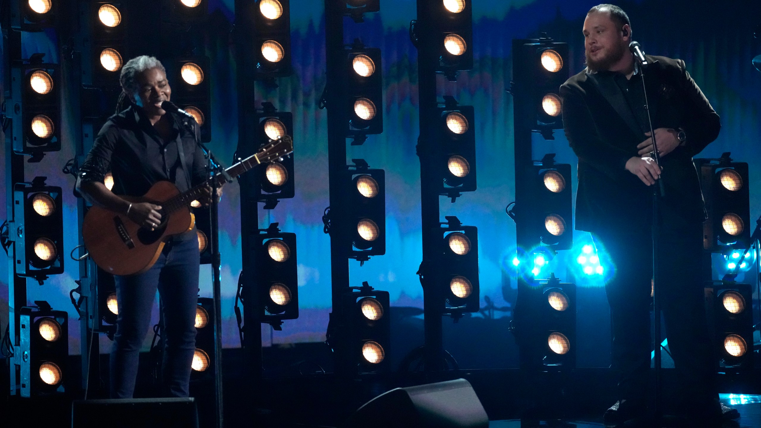 Tracy Chapman, left, and Luke Combs perform "Fast Car" during the 66th annual Grammy Awards on Sunday, Feb. 4, 2024, in Los Angeles. (AP Photo/Chris Pizzello)