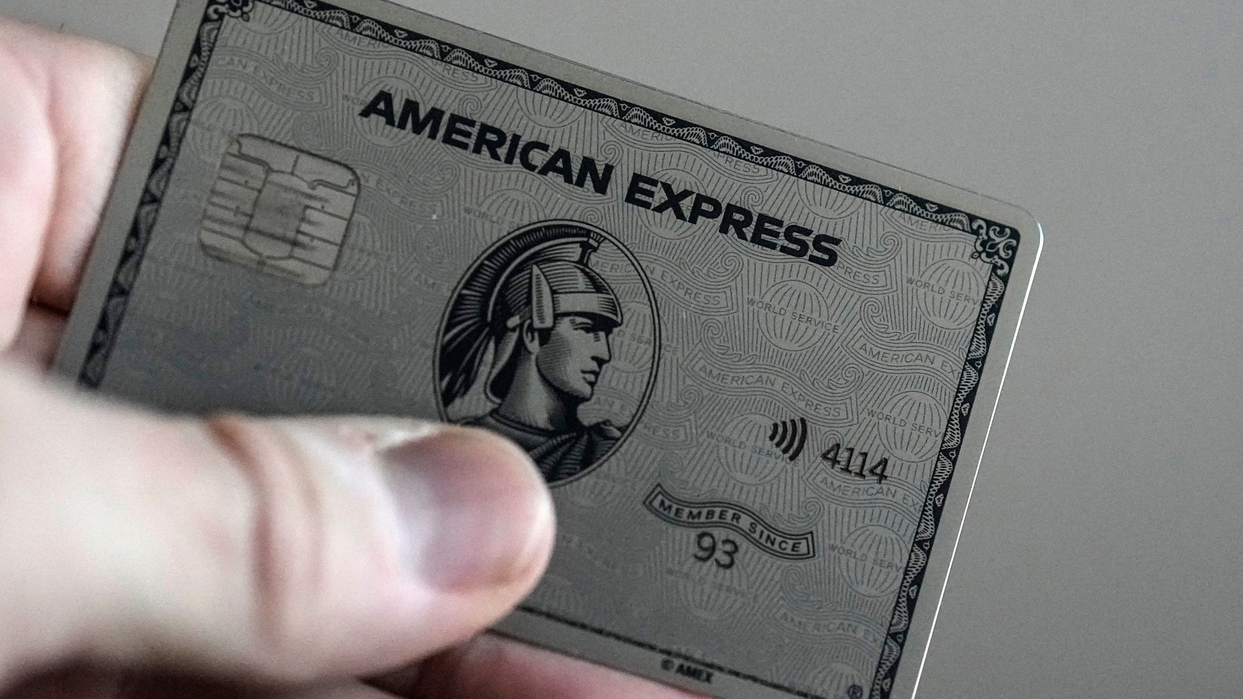 An American Express card is shown, Thursday, Jan. 18, 2024, in Atlanta. A combination of inflation, increased interest rates, and the end of pandemic-tied relief, such as the moratorium on student loan payments, has led to record credit card debt, experts say. (AP Photo/Mike Stewart)