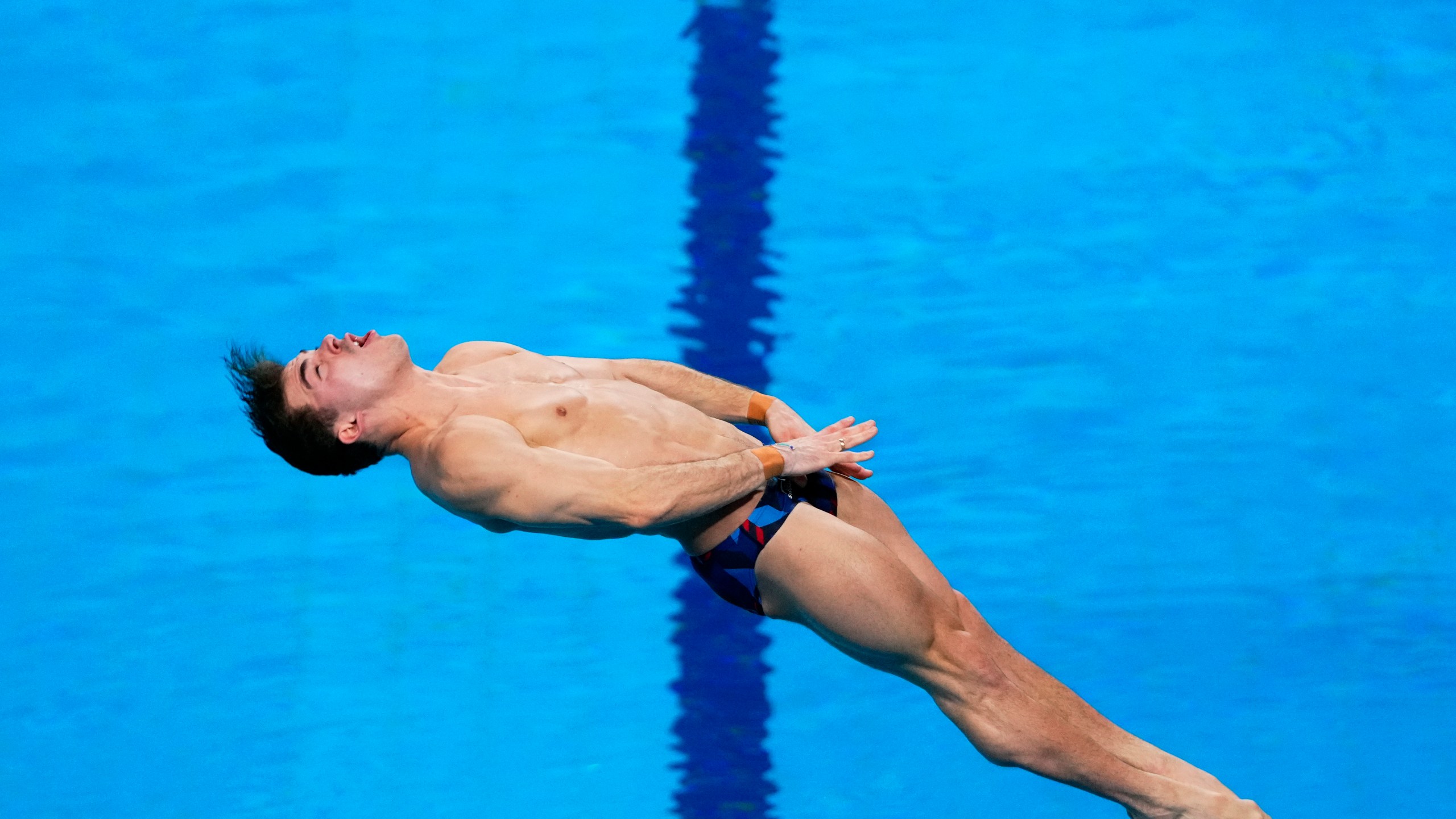 Ross Haslam of Great Britain competes during the men's 3m springboard diving semifinal at the World Aquatics Championships in Doha, Qatar, Wednesday, Feb. 7, 2024. (AP Photo/Hassan Ammar)