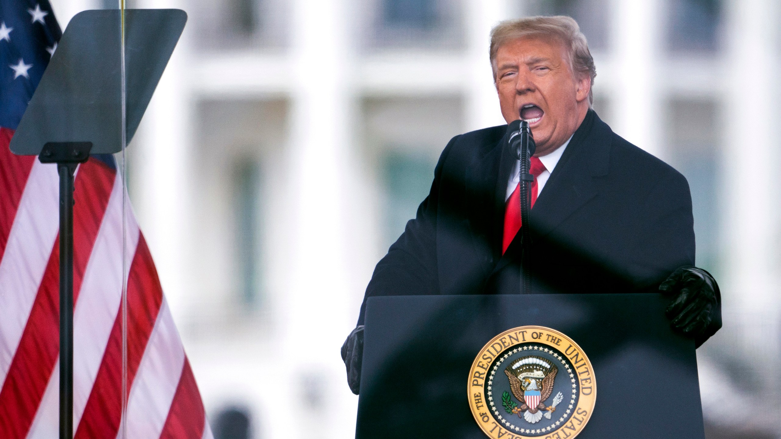 FILE - Then-President Donald Trump speaks during a rally protesting the Elector College certification of Joe Biden's win in the 2020 presidential race, in Washington on Jan. 6, 2021. The fate of former President Donald Trump’s attempt to return to the White House is in the U.S. Supreme Court’s hands. On Thursday, the justices will hear arguments in Trump’s appeal of a Colorado Supreme Court ruling that he is not eligible to run again for president because he violated a provision in the 14th Amendment preventing those who “engaged in insurrection” from holding office. (AP Photo/Evan Vucci, File)