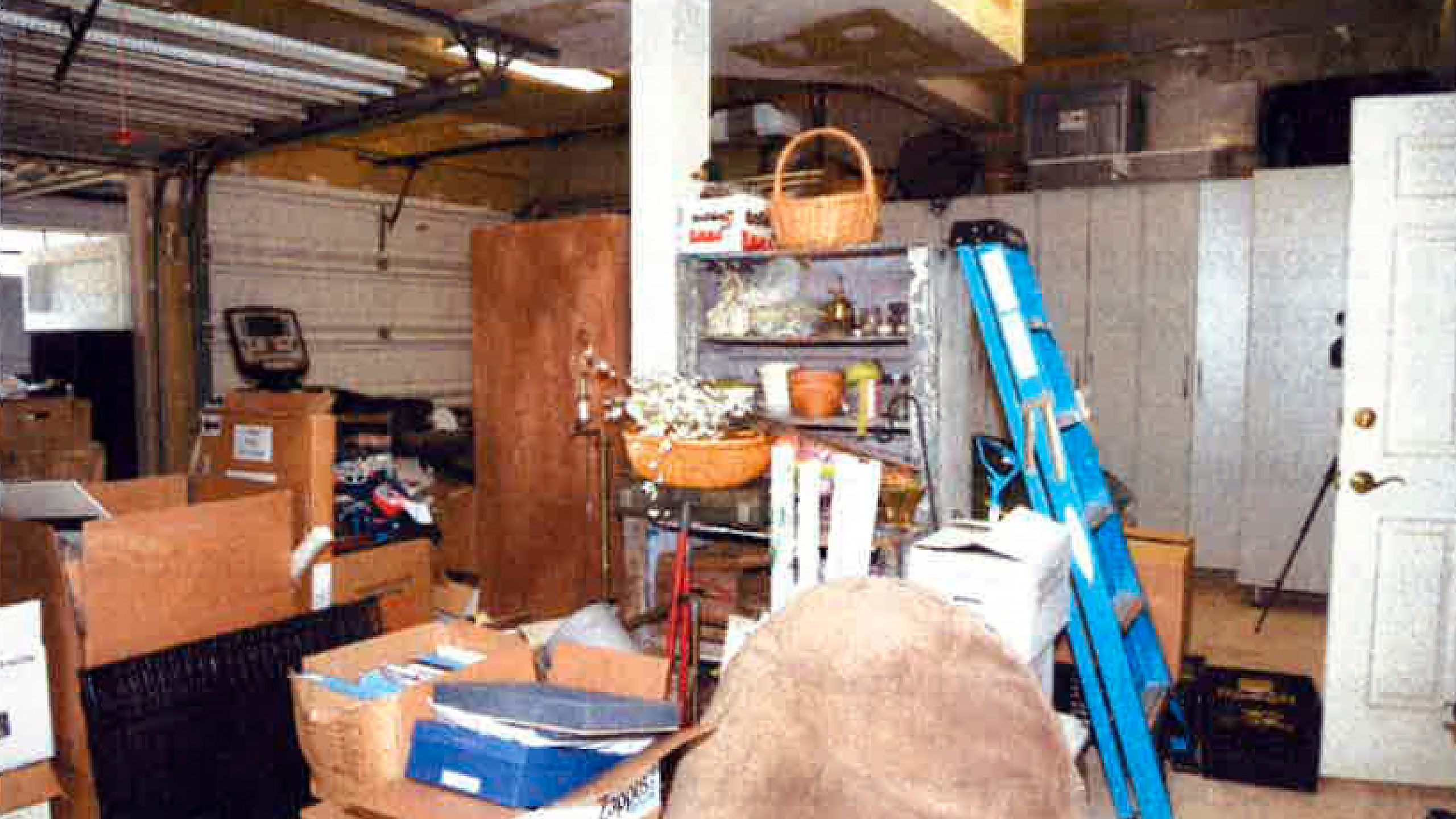 This image, contained in the report from special counsel Robert Hur, shows the cluttered garage of President Joe Biden in Wilmington, Del., during a search by the FBI on Dec. 21, 2022. (Justice Department via AP)