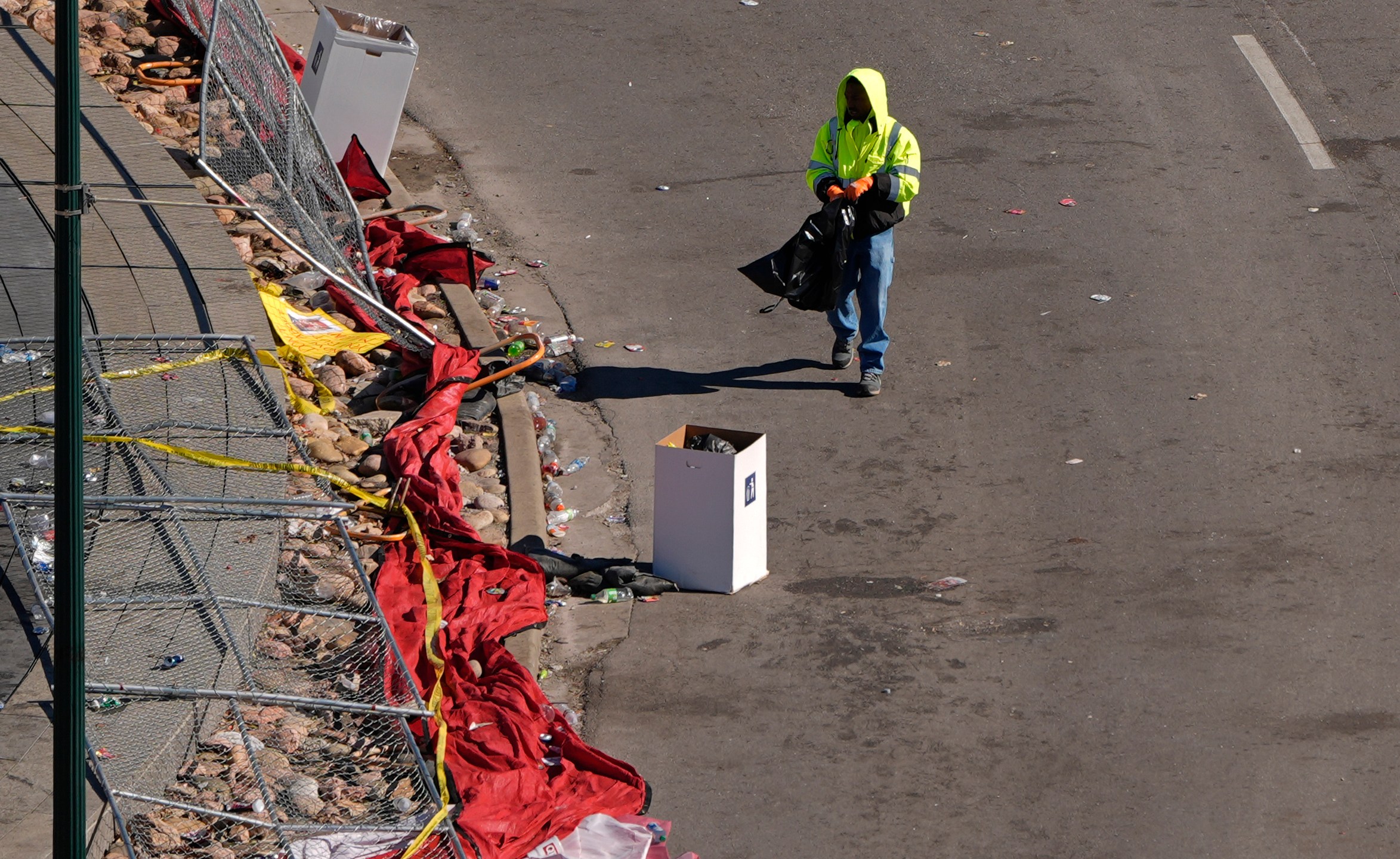 A worker cleans outside of Union Station Thursday, Feb. 15, 2024, in Kansas City, Mo. The venue was the site of a mass shooting Wednesday after a rally celebrating the Kansas City Chiefs winning the NFL Super Bowl 58 football game. (AP Photo/Charlie Riedel)