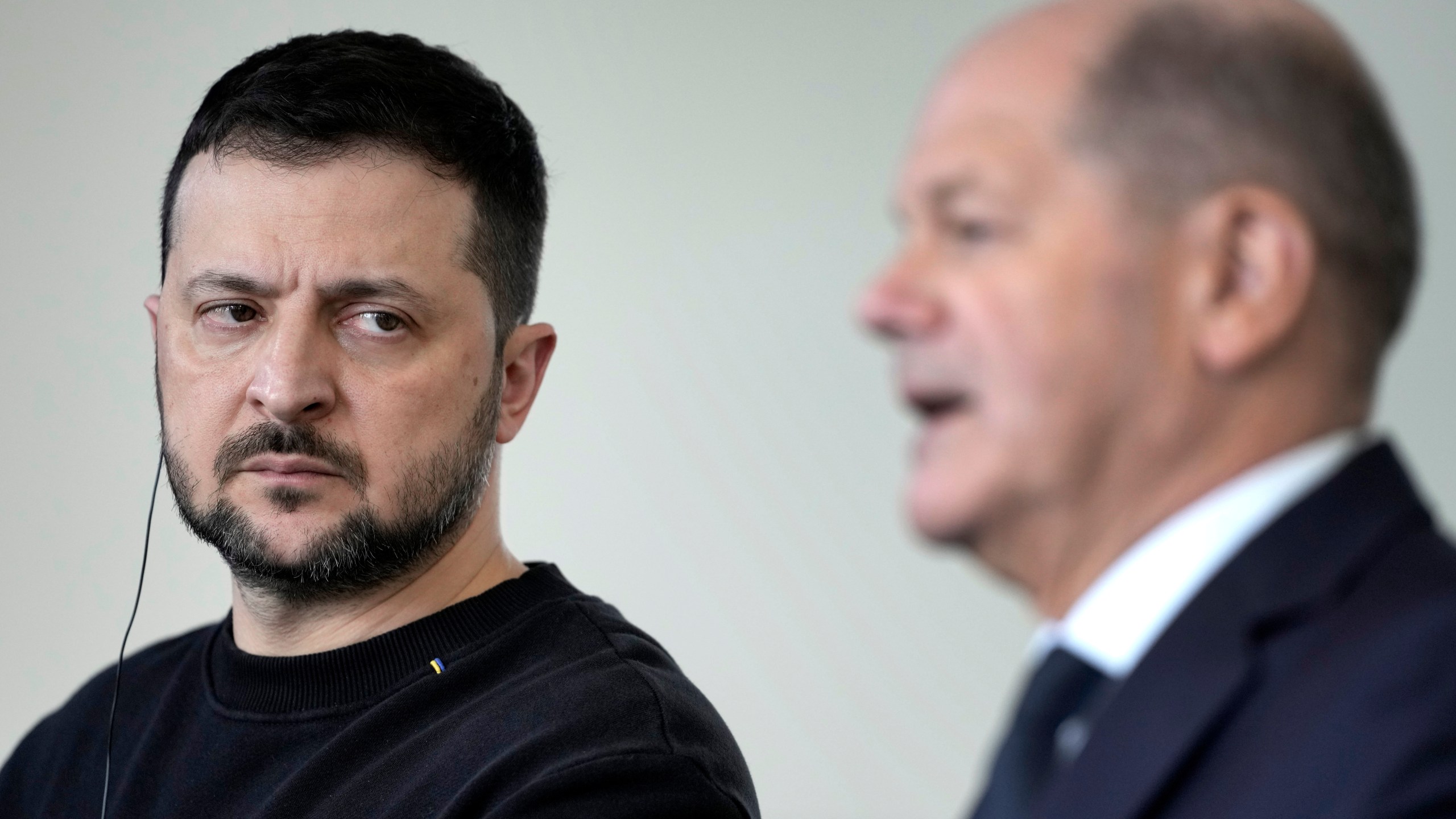 German Chancellor Olaf Scholz, right, and Ukrainian President Volodymyr Zelenskyy attend a press conference in the chancellory in Berlin, Friday, Feb.16, 2024. (AP Photo/Markus Schreiber)