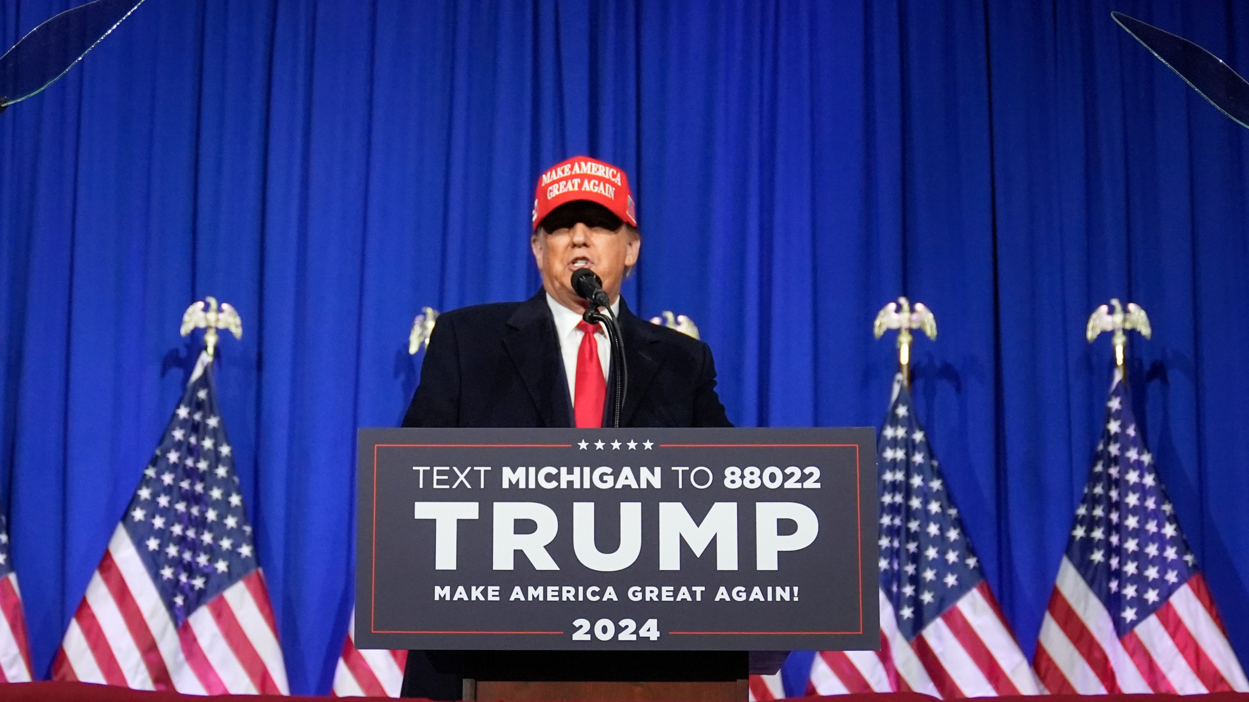 Republican presidential candidate former President Donald Trump speaks at an election rally in Waterford Township, Mich., Saturday, Feb. 17, 2024. (AP Photo/Paul Sancya)