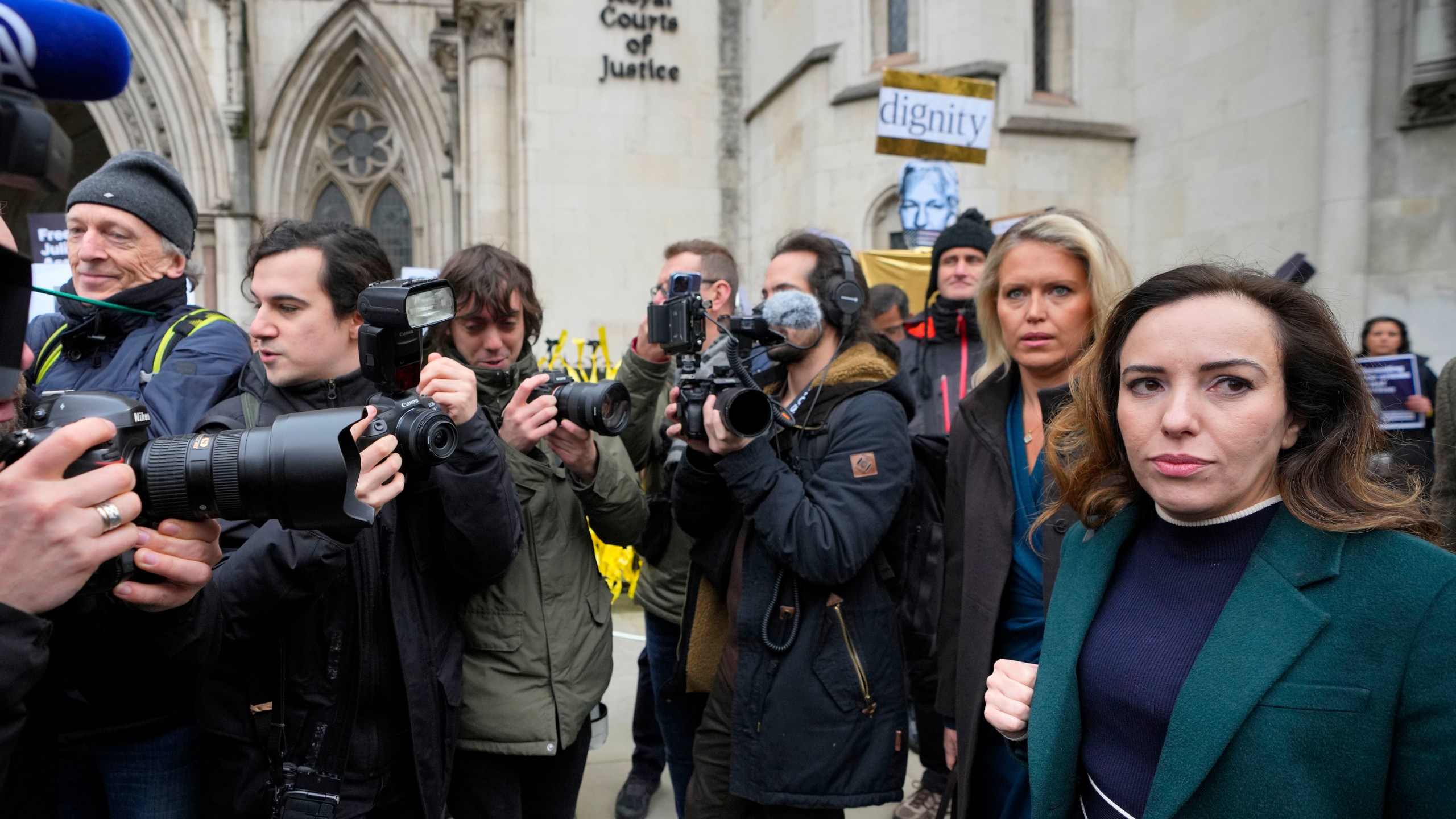 Stella Assange wife, right, of Julian Assange arrives at the Royal Courts of Justice in London, Tuesday, Feb. 20, 2024. WikiLeaks founder Julian Assange will make his final appeal against his impending extradition to the United States at the court. (AP Photo/Kirsty Wigglesworth)