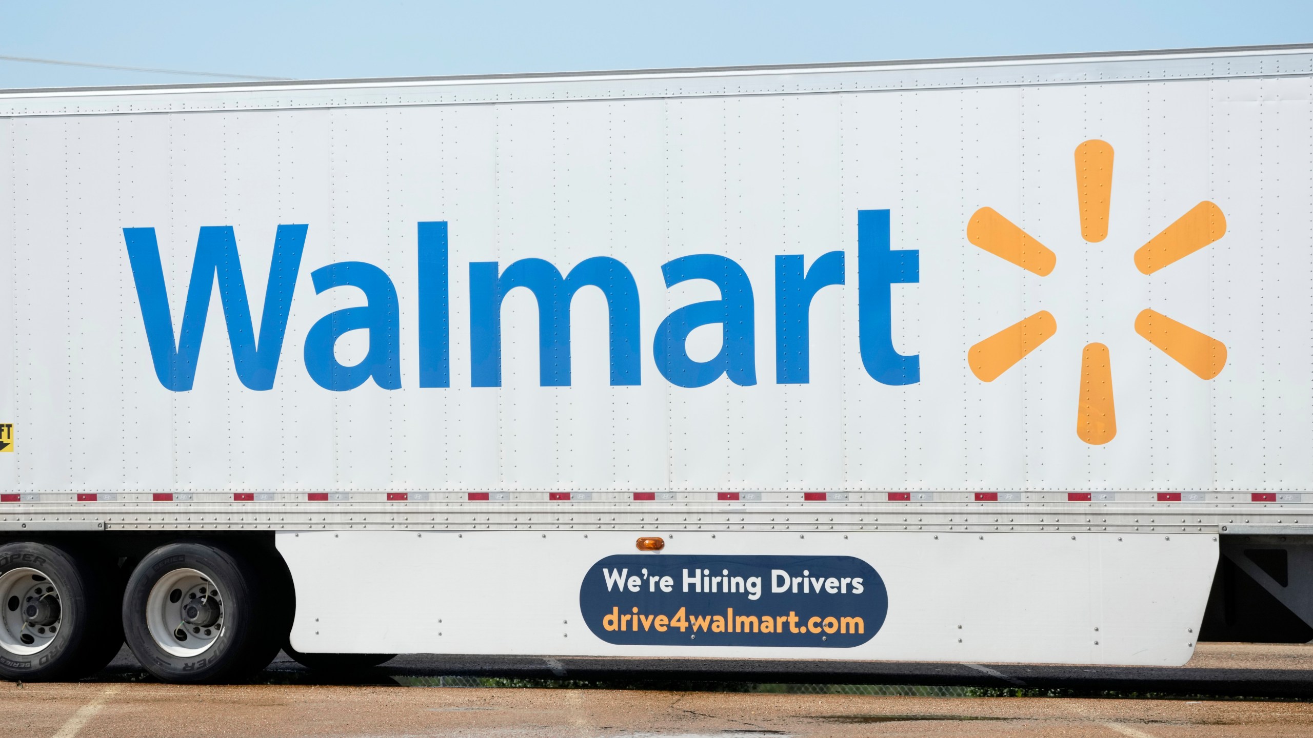 FILE - A tractor trailer bearing the Walmart logo in Richland, Miss., Sept. 6, 2023. Walmart reports earnings on Tuesday, Feb. 20, 2024. (AP Photo/Rogelio V. Solis, file)