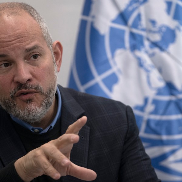 Dr. Adam Bouloukos the Director of United Nations Relief and Works Agency for Palestinian Refugees in the Near East (UNRWA) Affairs in the West Bank, speaks to journalists UNWRA at Aida Refugee Camp in the West Bank city of Bethlehem, Tuesday, Feb. 20, 2024. (AP Photo/Maya Alleruzzo)