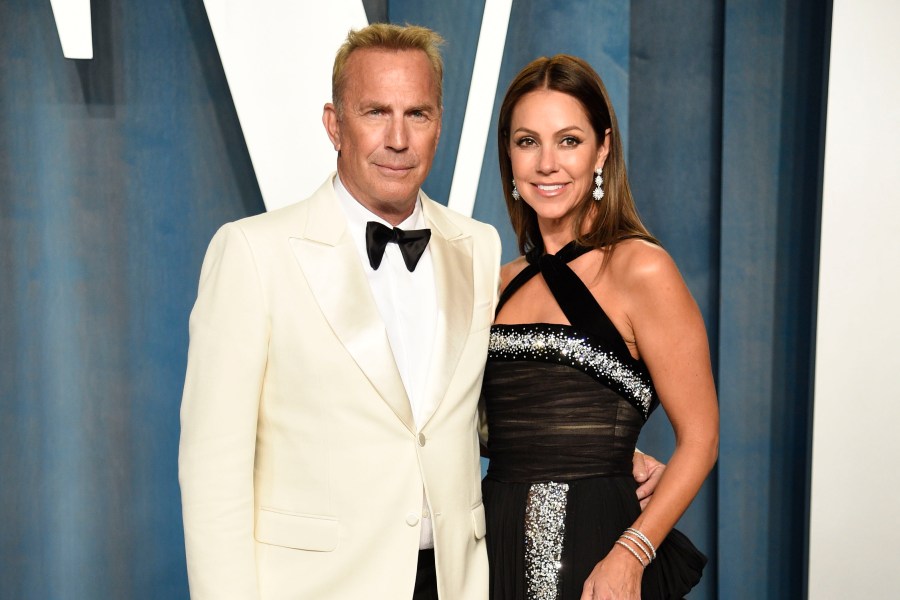 FILE - Kevin Costner, left, and Christine Baumgartner arrive at the Vanity Fair Oscar Party, March 27, 2022, in Beverly Hills, Calif. A judge has declared that Costner and his wife of nearly two decades, Baumgartner, are now legally divorced, according to court records filed Tuesday, Feb. 20, 2024. (Photo by Evan Agostini/Invision/AP, File)