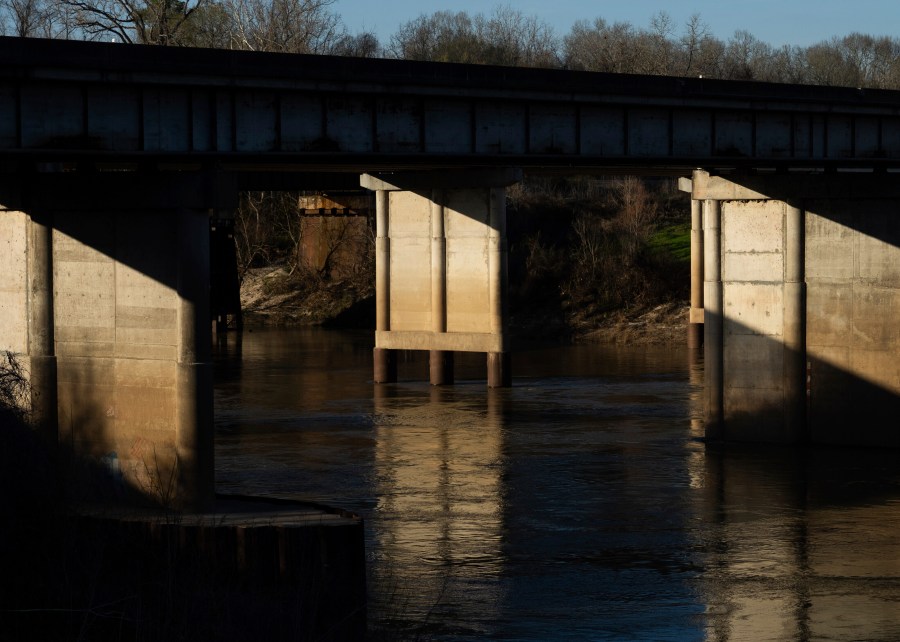 The Trinity River is seen near where law enforcement found the body of 11-year-old Audrii Cunningham, Tuesday, Feb. 20, 2024, in Livingston, Texas. Divers have recovered the body Cunningham days after the girl went missing, and authorities are preparing to file a murder charge against a friend of her father who lived on her family’s property, a sheriff said Tuesday afternoon. (Jason Fochtman/Houston Chronicle via AP)