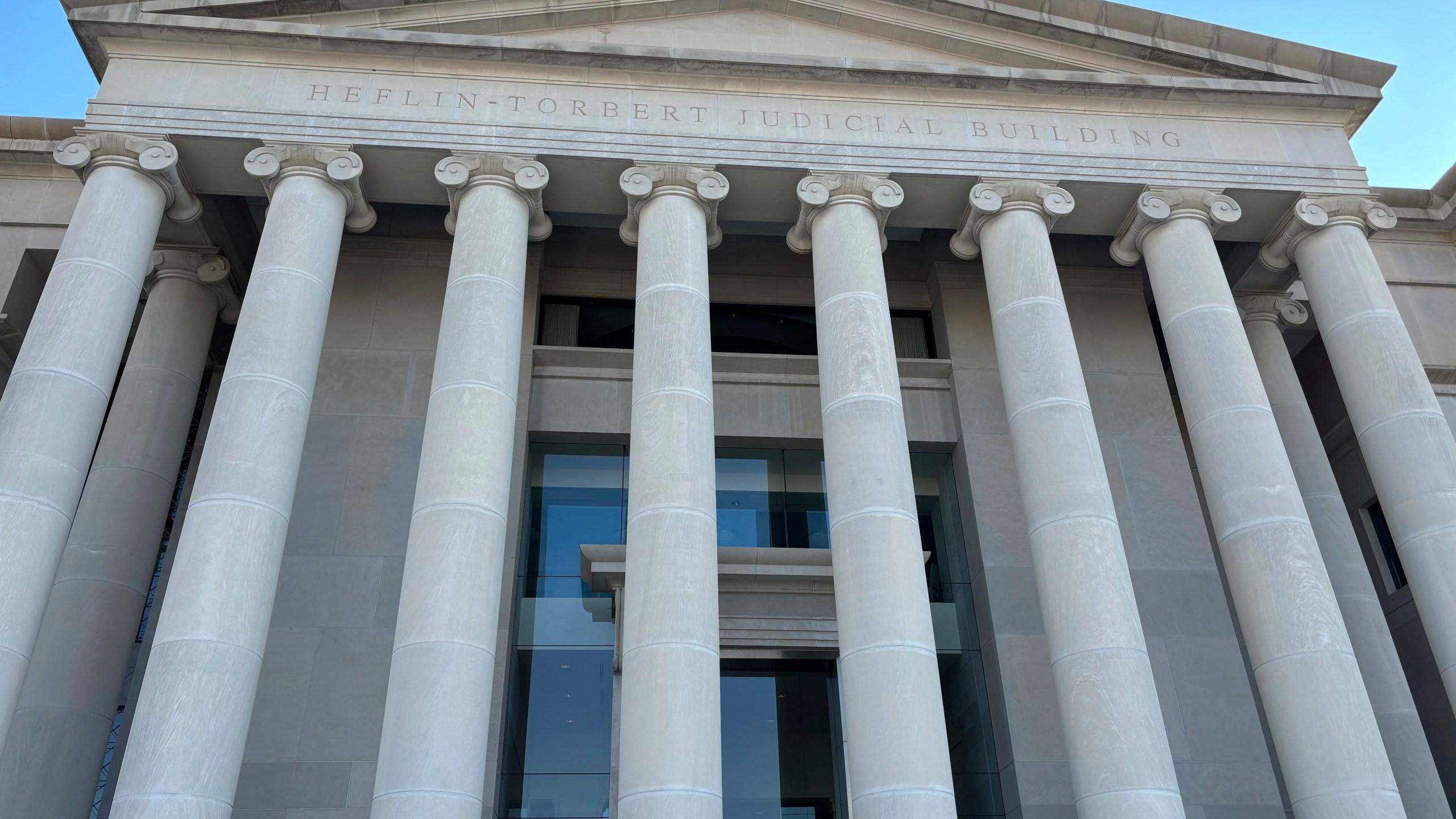 The exterior of the Alabama Supreme Court building in Montgomery, Ala., is shown Tuesday, Feb. 20, 2024. The Alabama Supreme Court ruled, Friday, Feb. 16, 2024, that frozen embryos can be considered children under state law, a ruling critics said could have sweeping implications for fertility treatments. The decision was issued in a pair of wrongful death cases brought by three couples who had frozen embryos destroyed in an accident at a fertility clinic. (AP Photo/Kim Chandler)