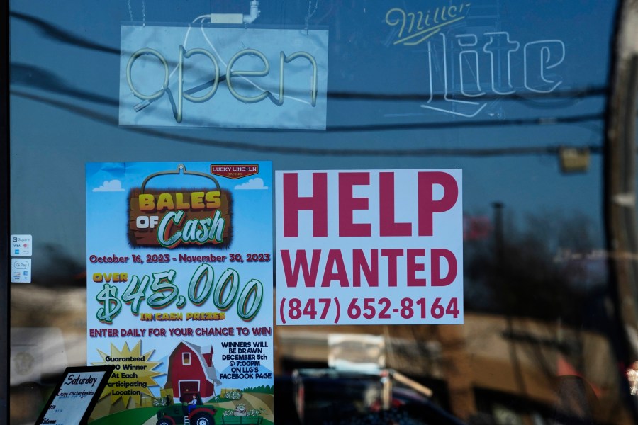 A "Help Wanted" sign is displayed at a restaurant in Buffalo Grove, Ill., Thursday, Jan. 18, 2024. On Thursday, Feb. 22, 2024, the Labor Department reports on the number of people who applied for unemployment benefits last week. (AP Photo/Nam Y. Huh)