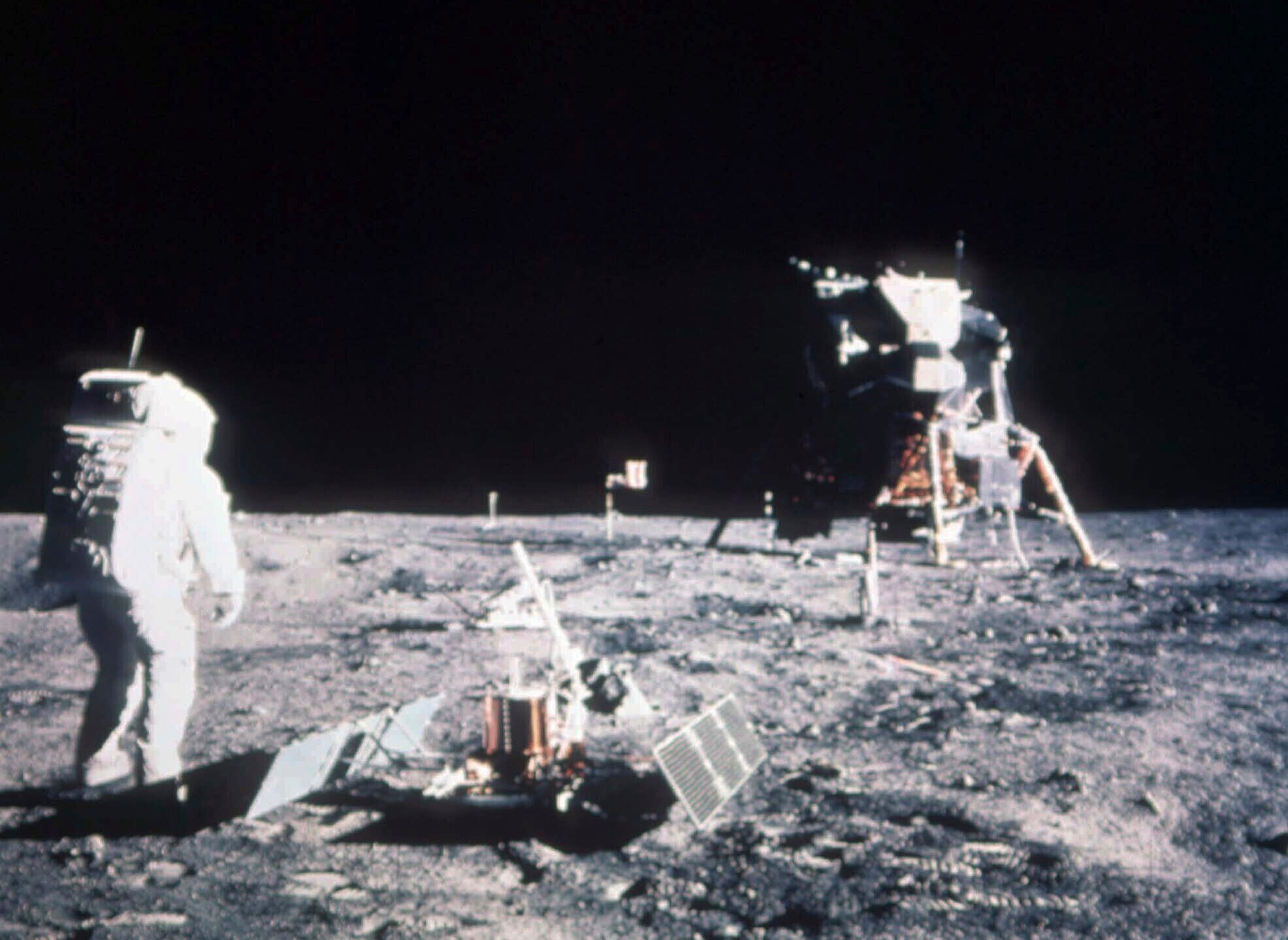 FILE- In this image released by NASA< Astronaut Edwin E. Aldrin Jr., lunar module pilot, stands on the lunar surface after the Apollo 11 moon landing on July 20, 1969. The Lunar Module is seen in the background. (AP Photo/File)