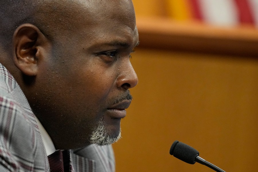 Terrence Bradley, special prosecutor Nathan Wade's former law partner and onetime divorce attorney, testifies in court Feb. 27, 2024, in Atlanta. Text messages obtained by The Associated Press show that the former law partner of a special prosecutor in the Georgia election case against Donald Trump was sharing information with a defense attorney of one of Trump’s co-defendants. Bradley fed attorney Ashleigh Merchant information over a period of several months, making suggestions to help her prove that special prosecutor Nathan Wade was involved in a relationship with Fulton District Attorney Fani Willis. (AP Photo/Brynn Anderson, Pool)