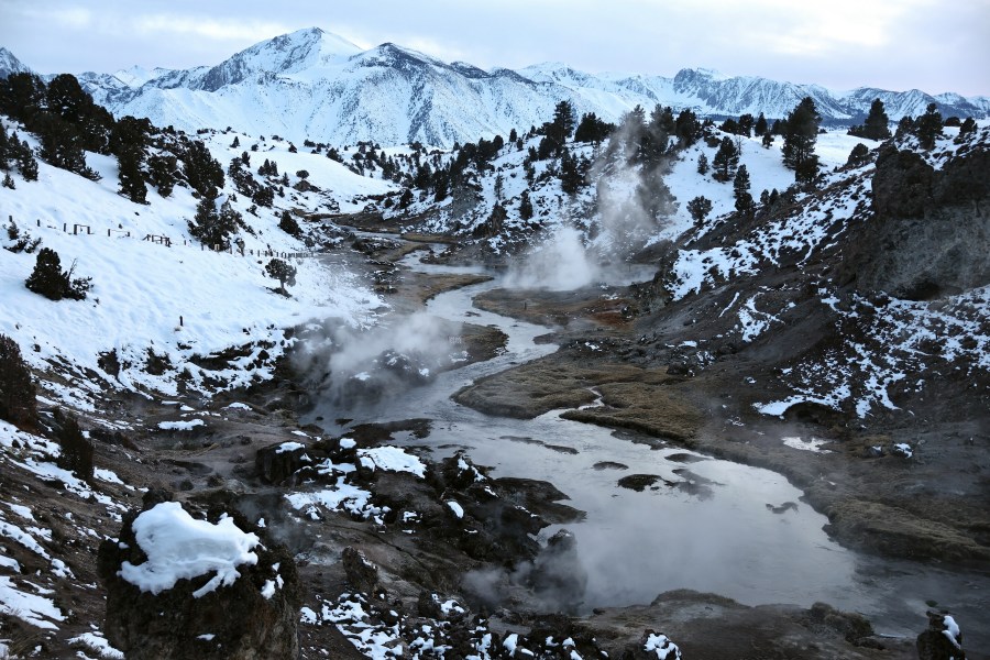 California Statewide Snowpack Rebounds To 86 Percent Following Recent Storms MAMMOTH LAKES, CALIFORNIA - FEBRUARY 23: Steam rises amid geothermal hot springs at the Hot Creek Geologic Site in front of snow blanketing the Sierra Nevada mountains after recent storms increased the snowpack on February 23, 2024 near Mammoth Lakes, California. California’s statewide snowpack currently stands at 86 percent of normal for the date, alleviating concerns of a ‘snow drought’ this year. On average, the Sierra Nevada snowpack melt provides about 30 percent of California's crucial water supply in a state which only recovered from drought last year. (Photo by Mario Tama/Getty Images)