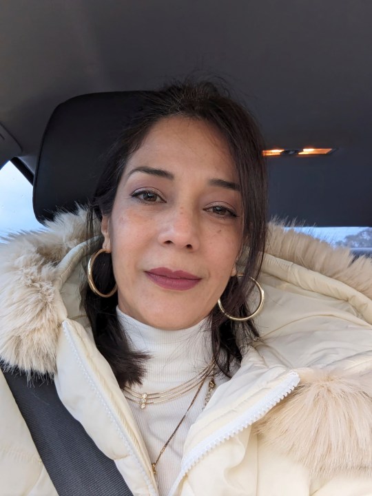 Berioskha Guevara, 53, poses for a selfie in Orlando, Florida, on Sunday, Jan. 14, 2024. Guevara, an opponent of the Venezuelan government who was struggling to buy food, arrived in the U.S. in July 2023 under the sponsorship of her brother as part of a humanitarian parole program created by the Biden administration. (Berioskha Guevara via AP)