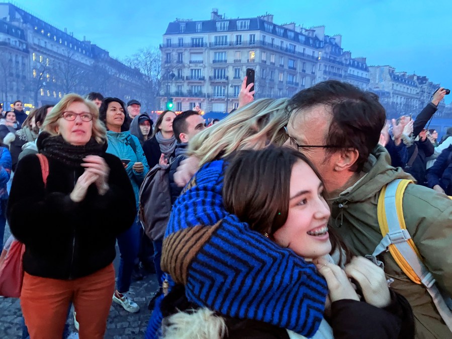 Pro-abortion supporters hug each other after French lawmakers have approved a bill that will enshrine a woman’s right to an abortion in the French Constitution, at Trocadero Plaza in Paris, Monday, March 4, 2024. The vote makes France the first country to have a constitutional right to abortion since the former Yugoslavia inscribed it in its 1974 constitution. (AP Photo/Oleg Cetinic)