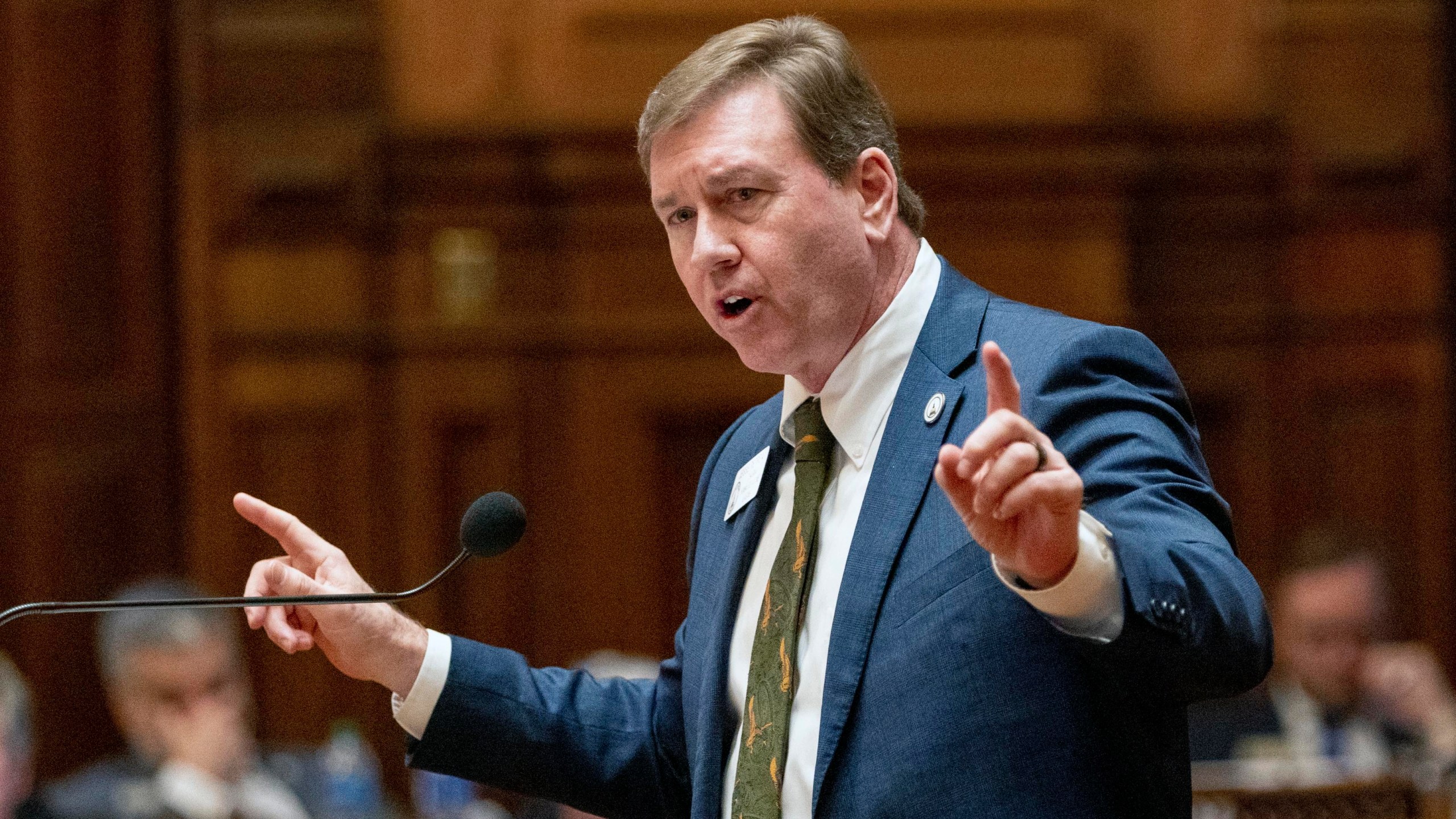 State Rep. Jesse Petrea, R-Savannah, presents arguments for HB 1105, which would penalize sheriffs who don't coordinate with federal immigration authorities, at the House of Representatives in Atlanta on Thursday, Feb. 29, 2024. (Arvin Temkar/Atlanta Journal-Constitution via AP)