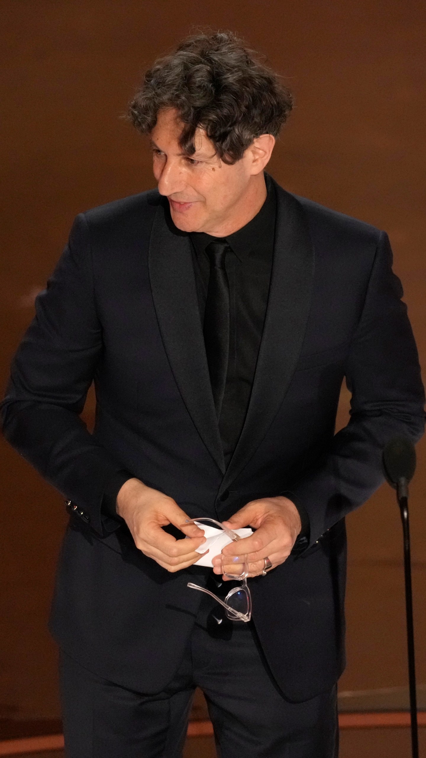 Jonathan Glazer accepts the award for "The Zone of Interest" from the United Kingdom, for best international feature film during the Oscars on Sunday, March 10, 2024, at the Dolby Theatre in Los Angeles. (AP Photo/Chris Pizzello)