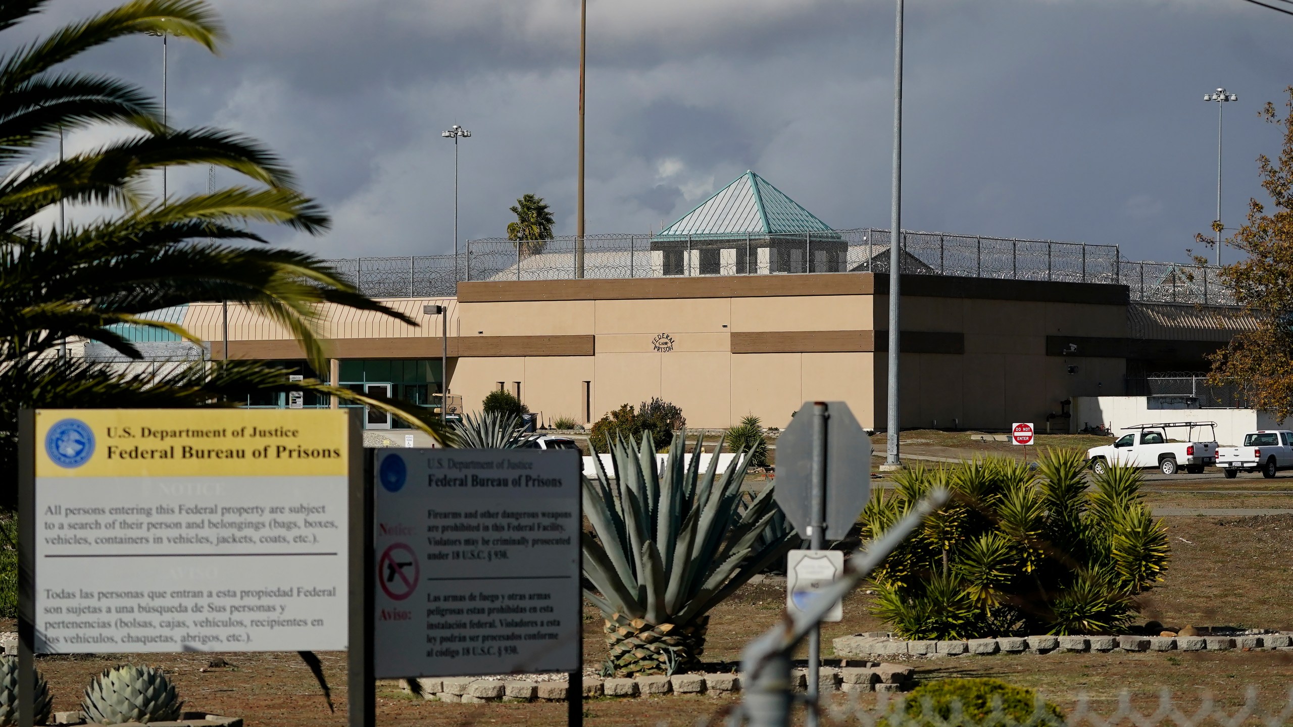 FILE - The Federal Correctional Institution stands in Dublin, Calif., on Dec. 5, 2022. Federal investigators on Monday, March 11, 2024, are again searching the troubled women's prison, seizing computers and documents in an apparent escalation of a yearslong sexual abuse investigation that led to previous charges against a former warden and other employees. (AP Photo/Jeff Chiu, File)