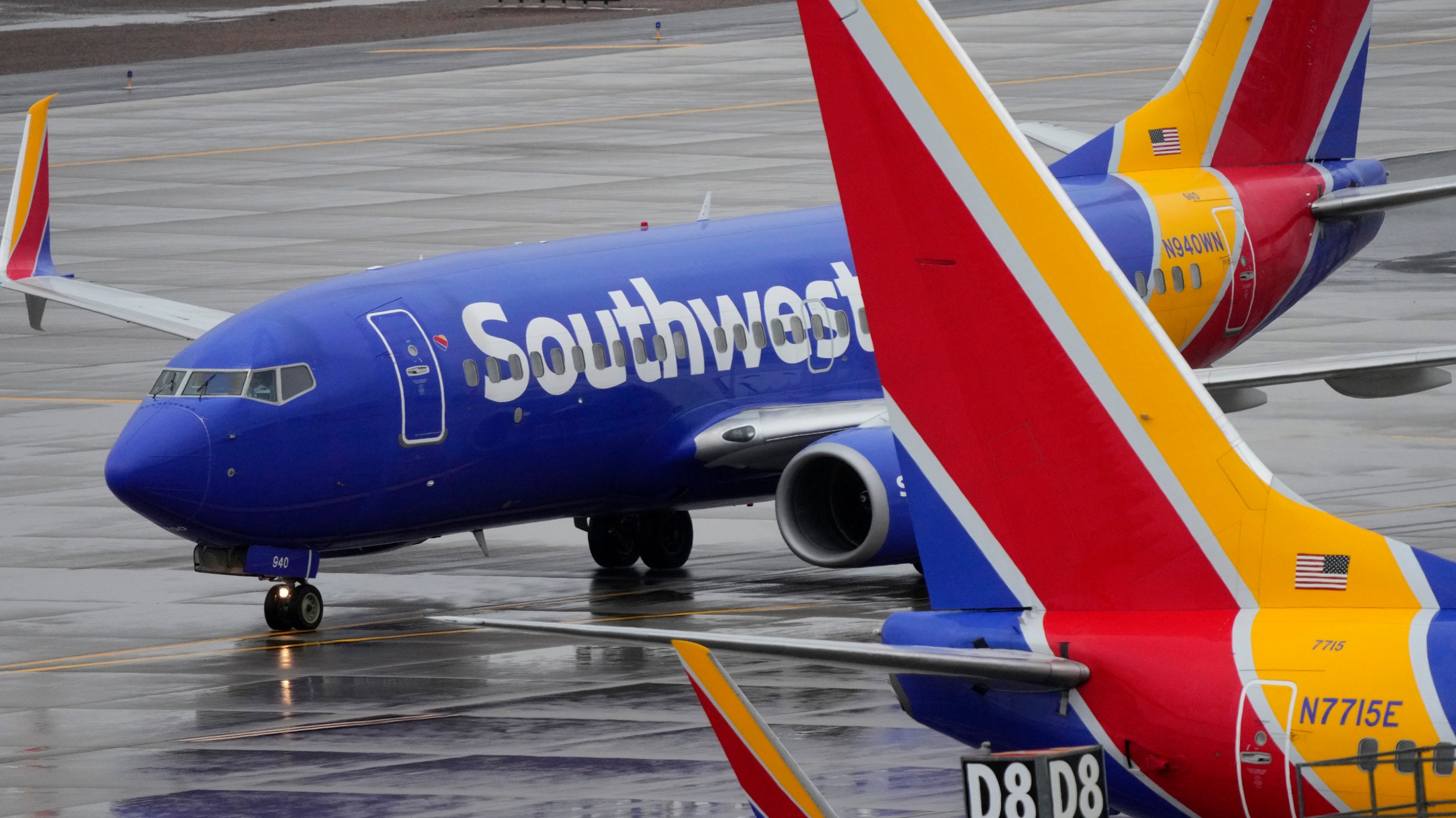 FILE - A Southwest Airlines jet arrives at Sky Harbor International Airport in Phoenix on Dec. 28, 2022. Shares of Southwest are falling in Tuesday, March 12, 2024, premarket trading as the airline said that it plans to reduce capacity and reevaluate its full-year financial outlook because of fewer expected aircraft deliveries from it supplier, Boeing. (AP Photo/Matt York, File)