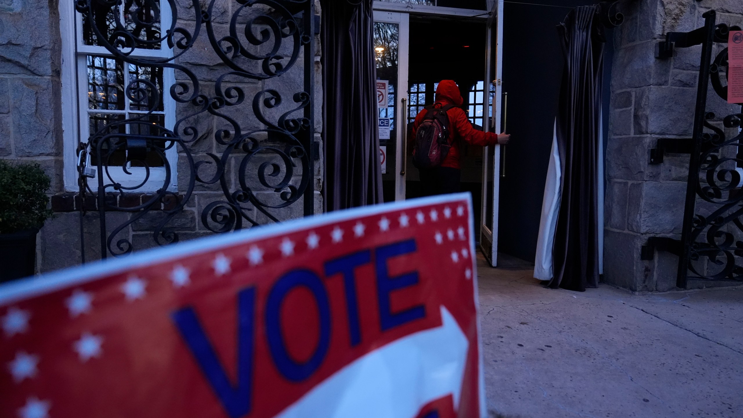 A voter enters a polling site for the Presidential primary election on Tuesday, March 12, 2024, in Atlanta. (AP Photo/Brynn Anderson)