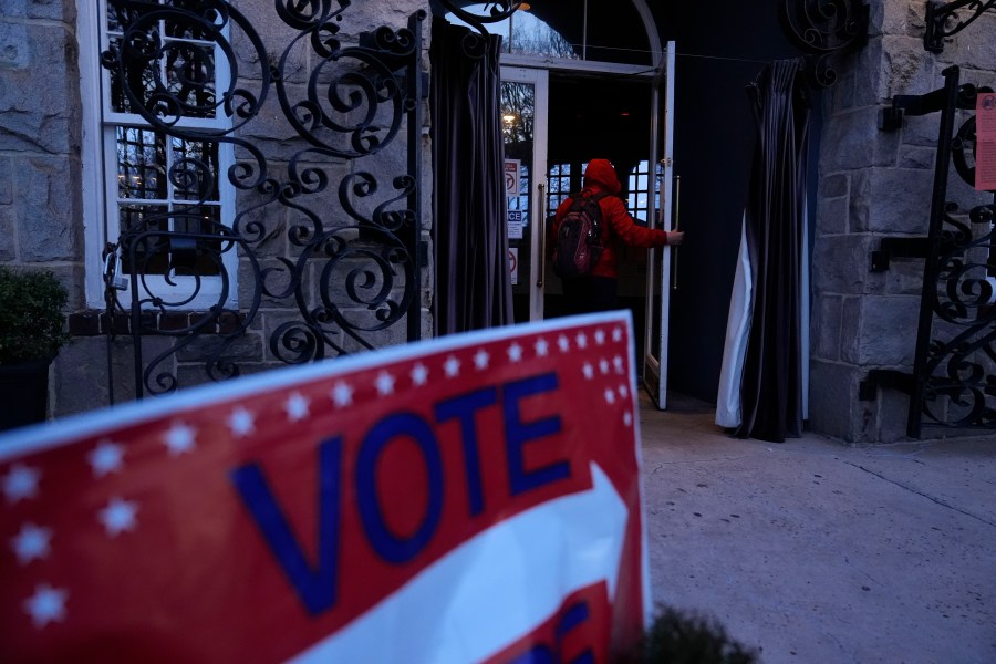 A voter enters a polling site for the Presidential primary election on Tuesday, March 12, 2024, in Atlanta. (AP Photo/Brynn Anderson)