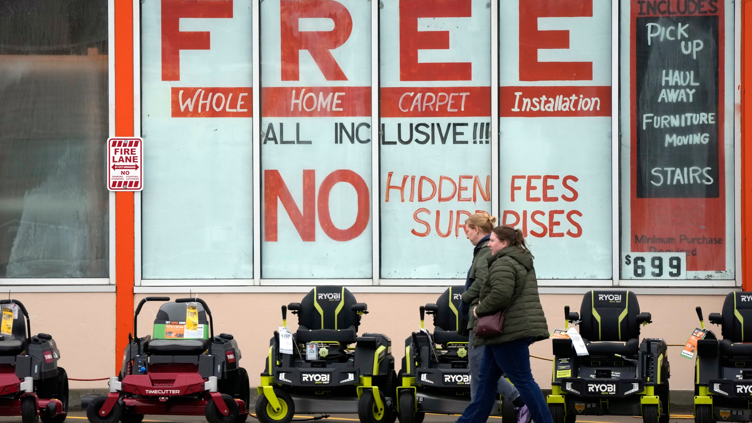 Lawnmowers are displayed outside a Home Depot store in Uniontown, Pa. on Saturday, Mar. 2, 2024. On Friday, March 15, 2024, the University of Michigan releases its preliminary reading of consumer sentiment for March.(AP Photo/Gene J. Puskar)