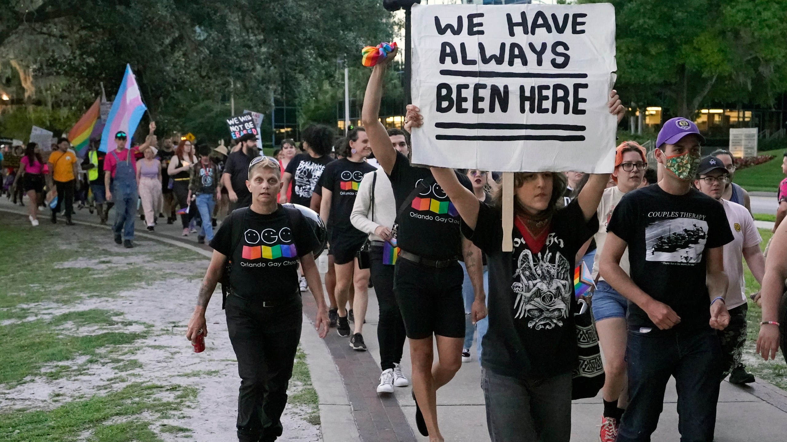 FILE - Hundreds of people, including immigrants rights groups, abortion rights groups and members of the LGBTQ community from across the state take part in a rally and march, Monday, May 1, 2023, in Orlando, Fla. The rights of LGBTQ+ people continue to be in flux across the U.S. with a new flurry of developments. (AP Photo/John Raoux, File)