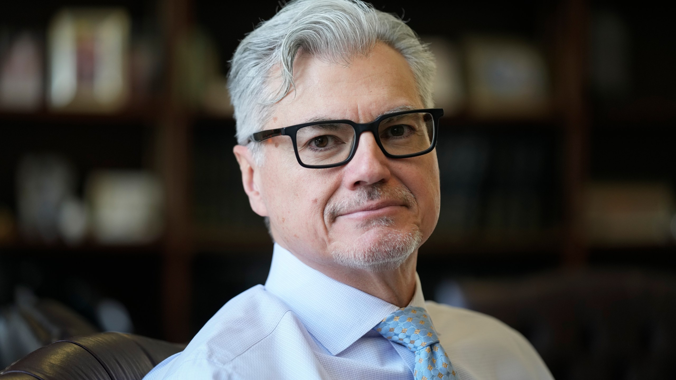 Judge Juan Merchan poses for a picture in his chambers in New York, Thursday, March 14, 2024. Merchan could become the first judge ever to oversee a former U.S. president’s criminal trial. He's presiding over Donald Trump’s hush money case in New York. (AP Photo/Seth Wenig)