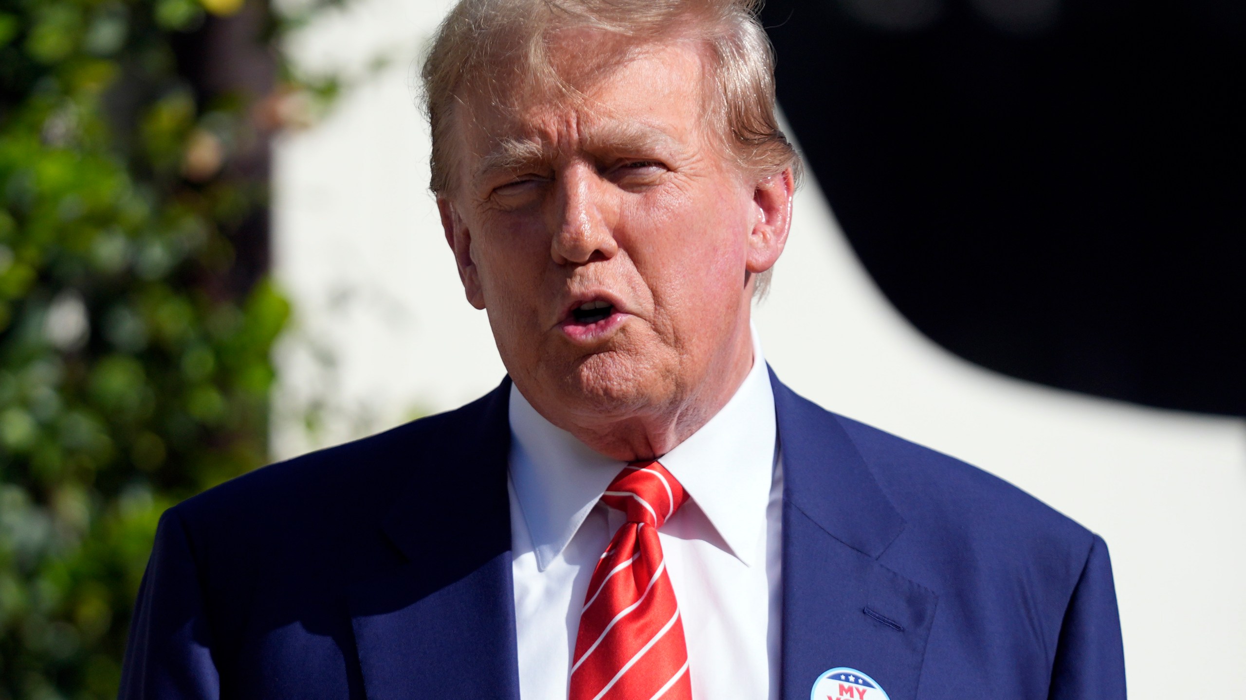 FILE - Republican presidential candidate former President Donald Trump speaks after voting in Florida's primary election in Palm Beach, Fla., Tuesday, March 19, 2024. Trump’s return to the stock market could be right around the corner. All eyes are on a vote Friday by shareholders of Digital World Acquisition Corp., a shell company that is looking to merge with the former president’s media business. (AP Photo/Wilfredo Lee, File)