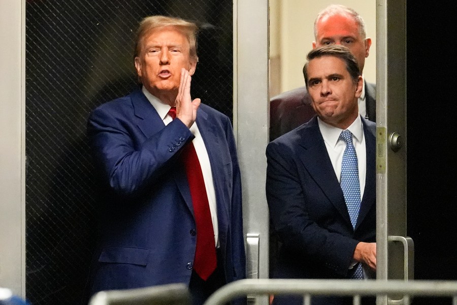 Former President Donald Trump comments as he leaves a pre-trial hearing during a recess with his defense team at Manhattan criminal, Monday, March 25, 2024, in New York. A judge will weigh on Monday when the former president will go on trial. (AP Photo/Mary Altaffer, Pool)